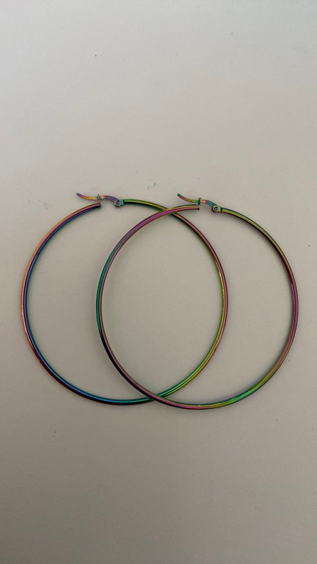 Oorbellen ringen. Diameter 7,5 cm, Ophalen of Verzenden, Zo goed als nieuw, Overige materialen