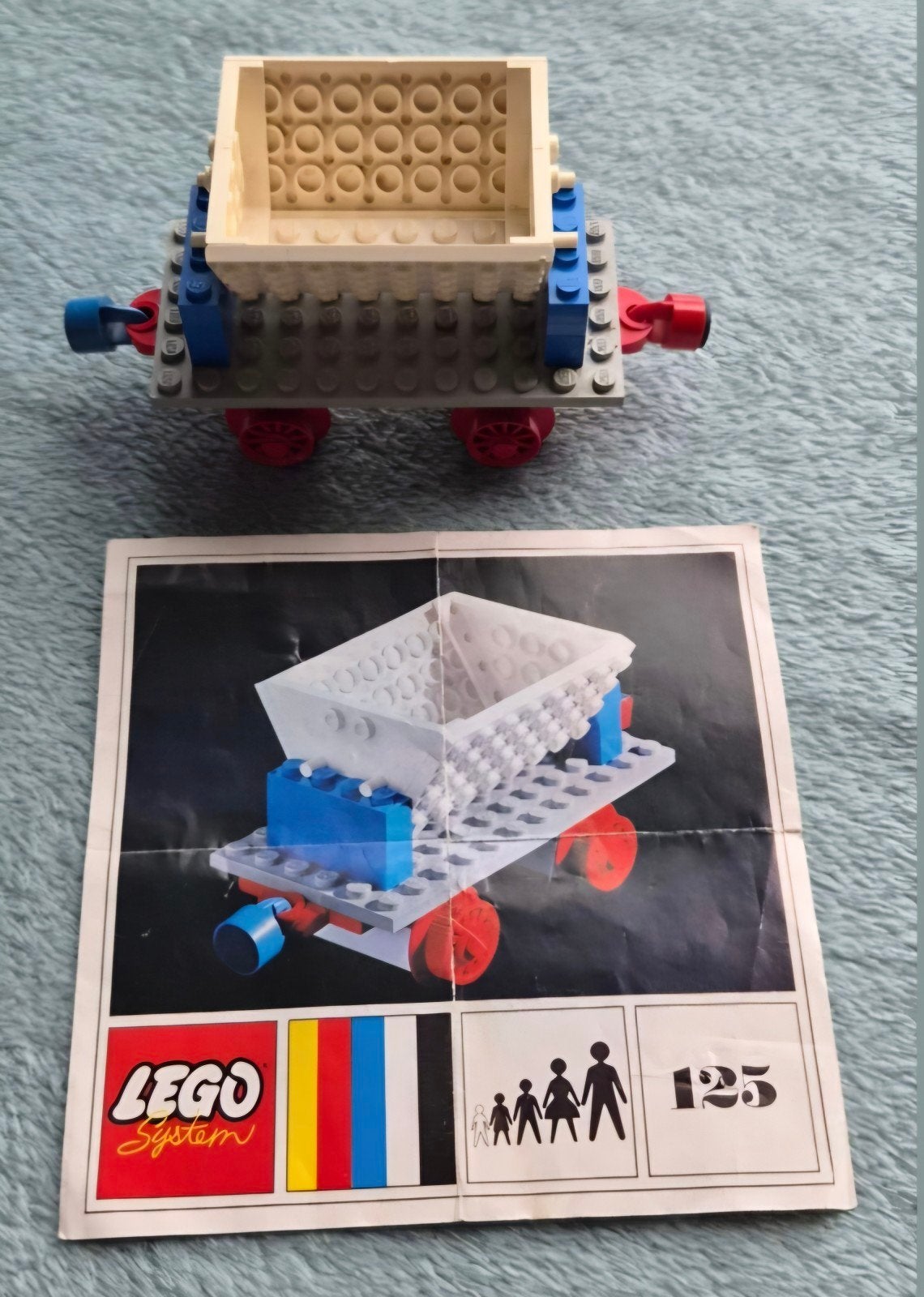 Lego trein blauwe rails kiep bak wagon (set 125) + bouw boek, Gebruikt, Lego, Inclusief instructies, Ophalen of Verzenden