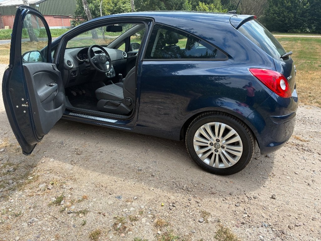 Opel Corsa 1.4 16V 3D 2012 Blauw, Auto's, Voorwielaandrijving, 40 €/maand, Blauw, Leder en Stof
