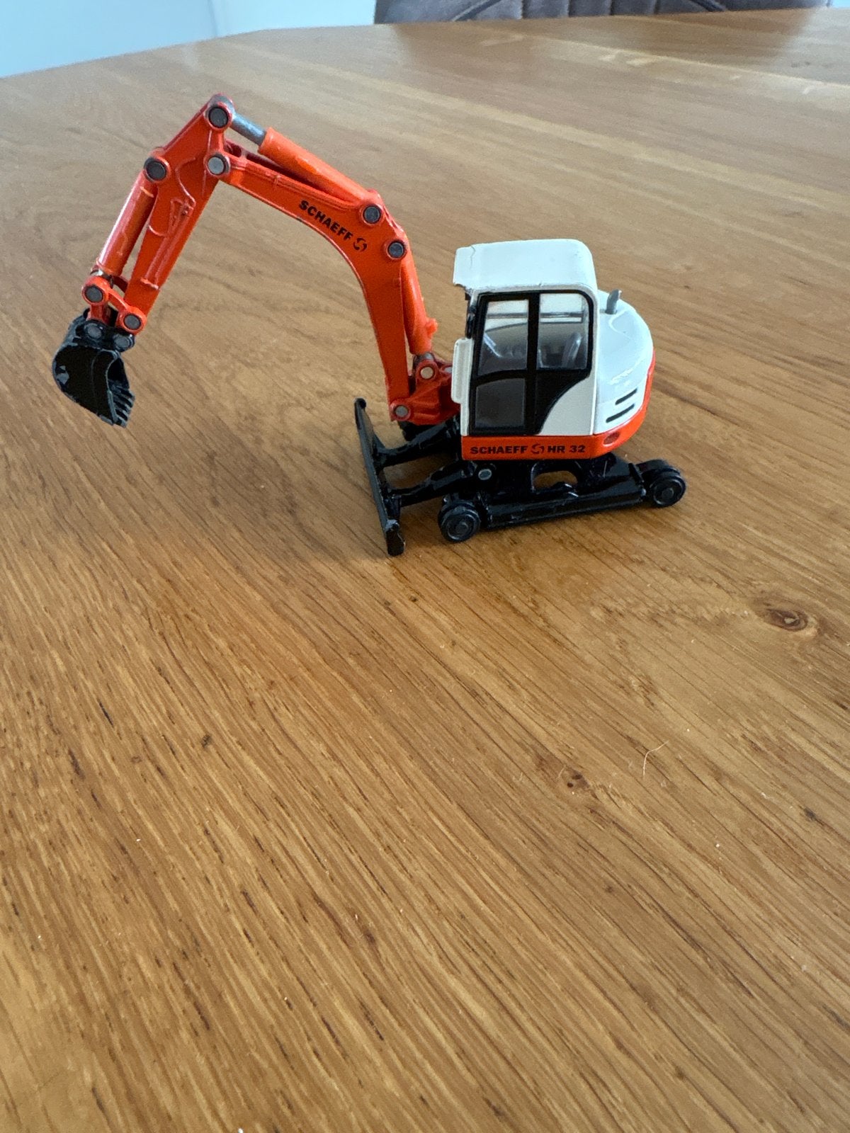 Schaeff HR 32 Mini Graafmachine Speelgoedmodel, Ophalen of Verzenden, Gebruikt