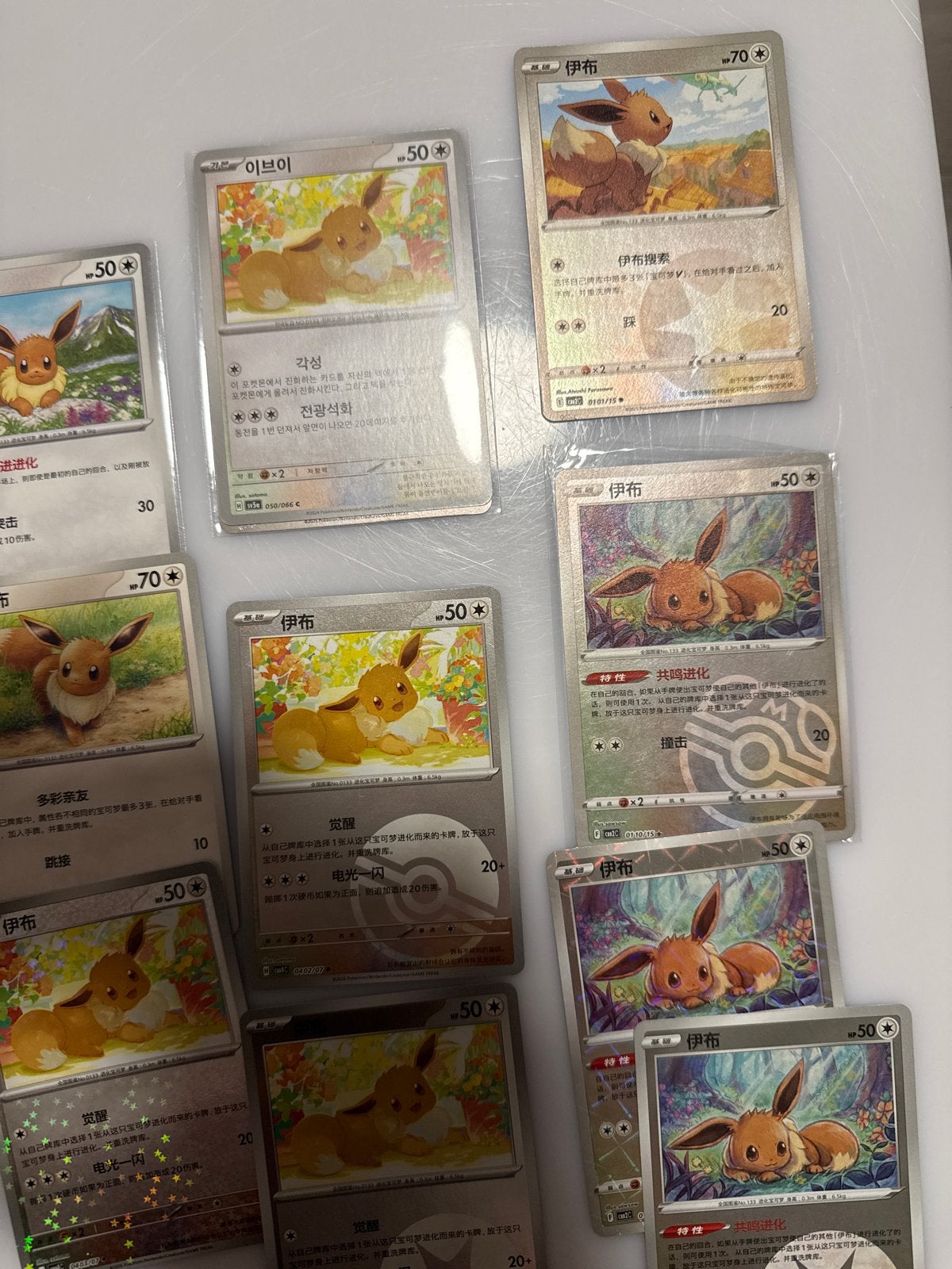 Lot van 39 Pokémon Eeveelutions kaarten, Hobby en Vrije tijd, Ophalen of Verzenden, Zo goed als nieuw, Meerdere kaarten, Foil