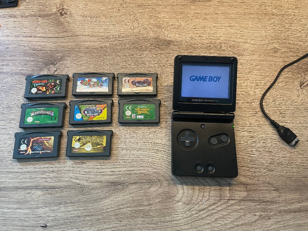 Gameboy Advance SP met spellen, lader en opbergtasje, Ophalen of Verzenden, Gebruikt, Game Boy Advance SP, Met beschermhoes of tas
