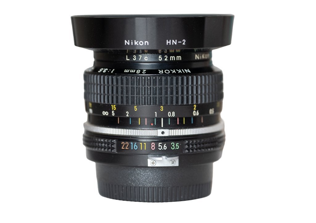 NIKON NIKKOR 28mm 1:3.5  nr. 258590, Nikon, Zo goed als nieuw, Nikon F-mount, Inclusief filter
