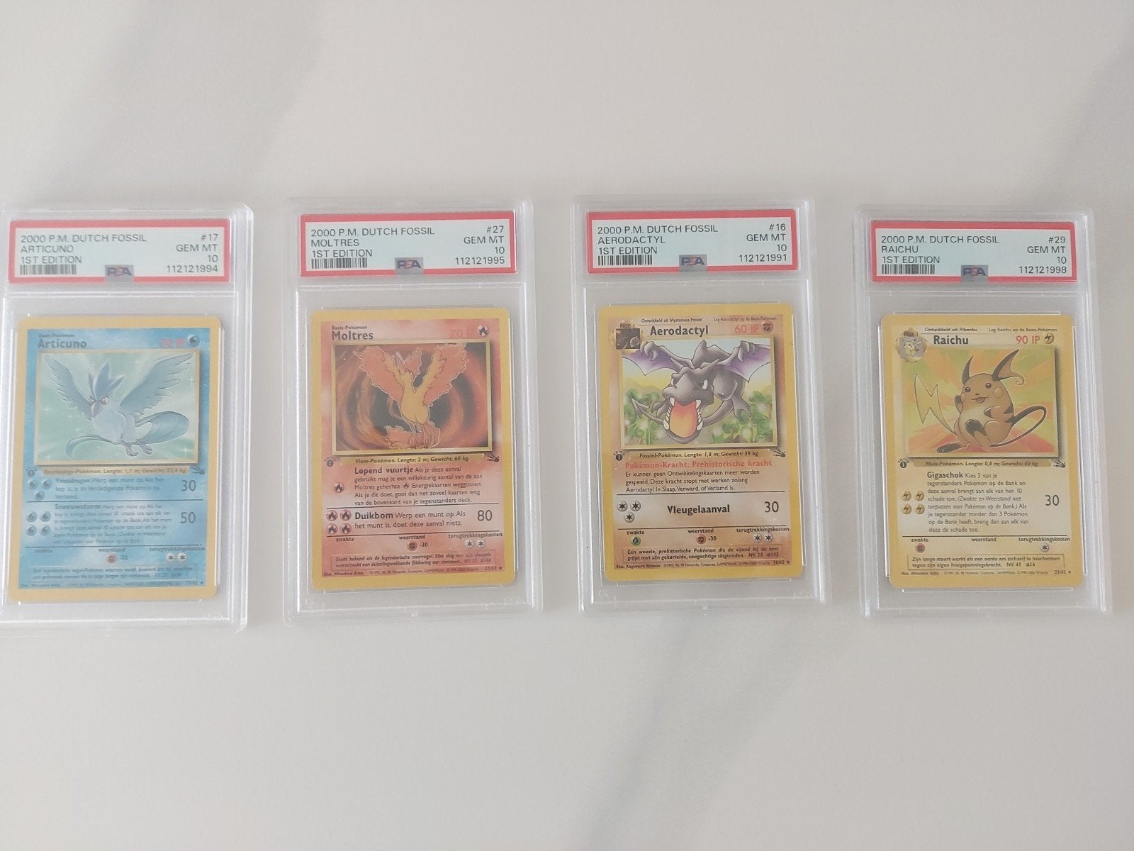 Pokémon Fossil 1st Edition PSA 10 GEM MT Set (4 kaarten), Ophalen of Verzenden, Zo goed als nieuw