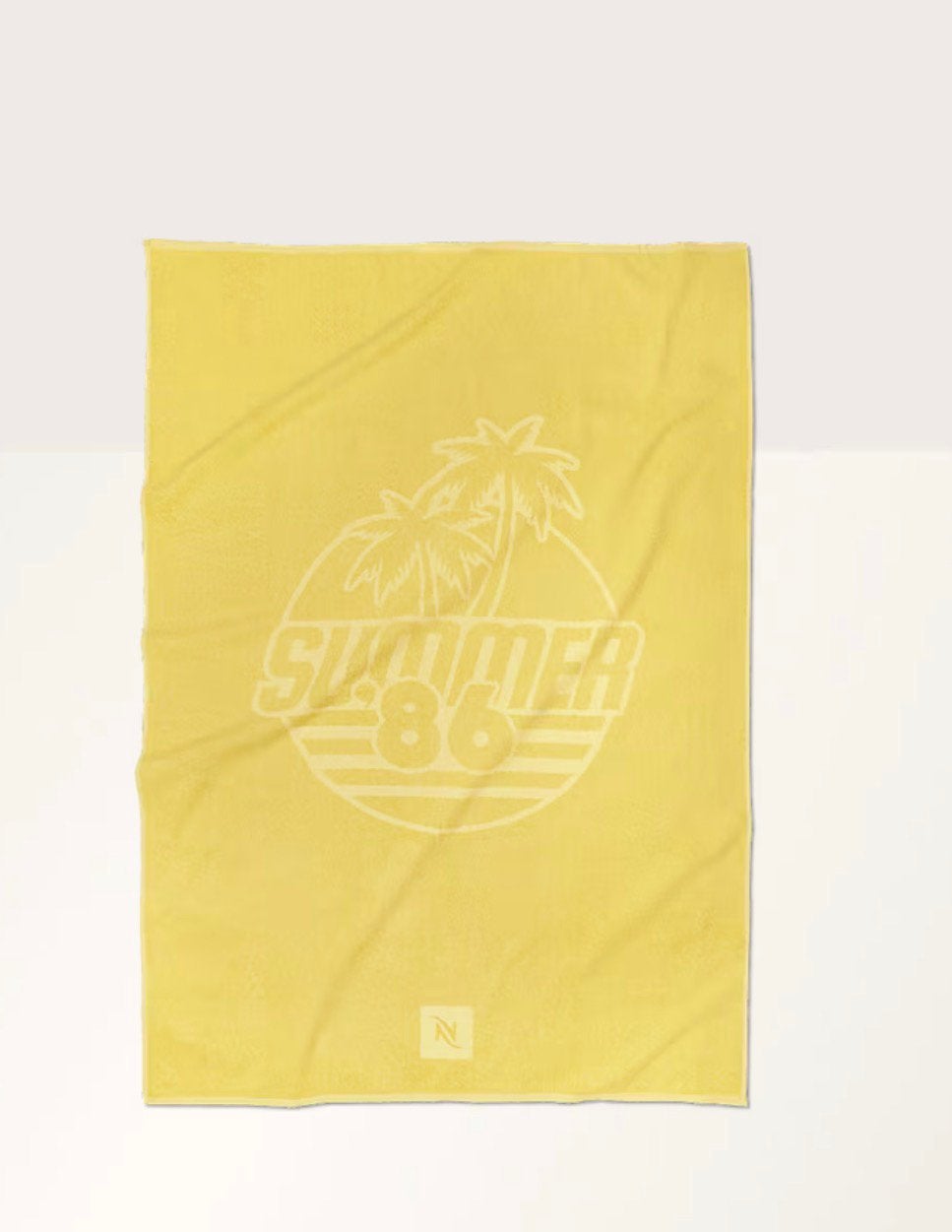 Nespresso strandlaken yuzu beach towel nieuw, Ophalen of Verzenden, Nieuw, Geel, Badlaken