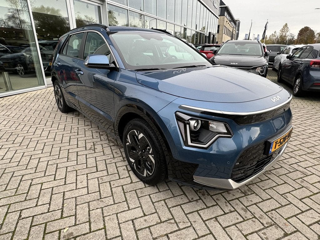 Kia Niro EV DynamicLine 64.8 kWh | Adaptieve cruise control, Auto's, Gebruikt, 750 kg, Leder en Stof, Origineel Nederlands