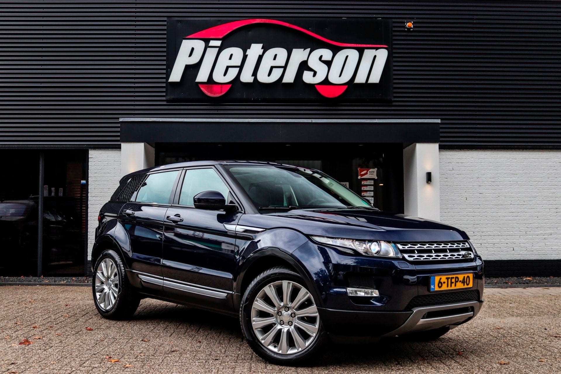Land Rover Range Rover Evoque 2.0 Si 4WD NAP MERIDIAN PANO, Auto's, Euro 5, 4 cilinders, Blauw, Bedrijf