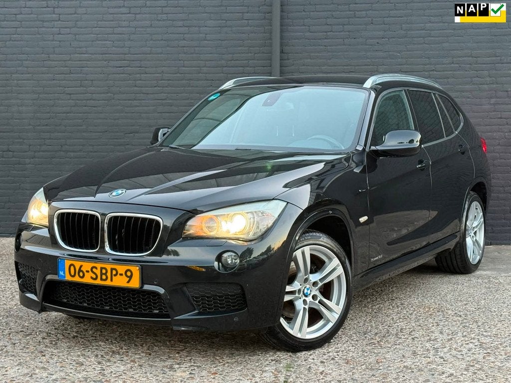 BMW X1 SDrive18i M SPORTPAKKET|NAVI|AIRCO|PDC | TREKHAAK | E, Auto's, X1, Euro 5, Zwart, 4 cilinders