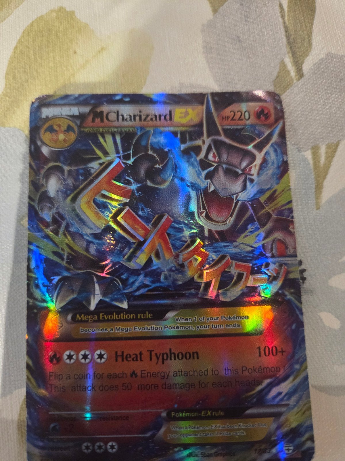 M Charizard EX Pokémon kaart - Holo Foil, Hobby en Vrije tijd, Ophalen of Verzenden, Gebruikt, Losse kaart, Foil