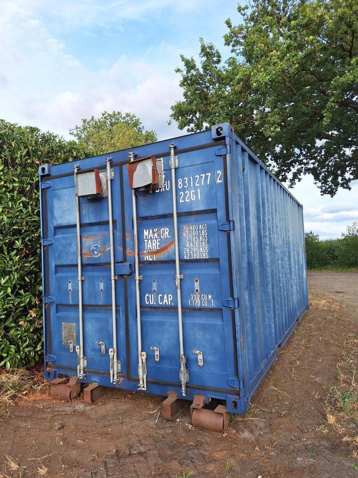 container  voor houtkrullen, Ophalen