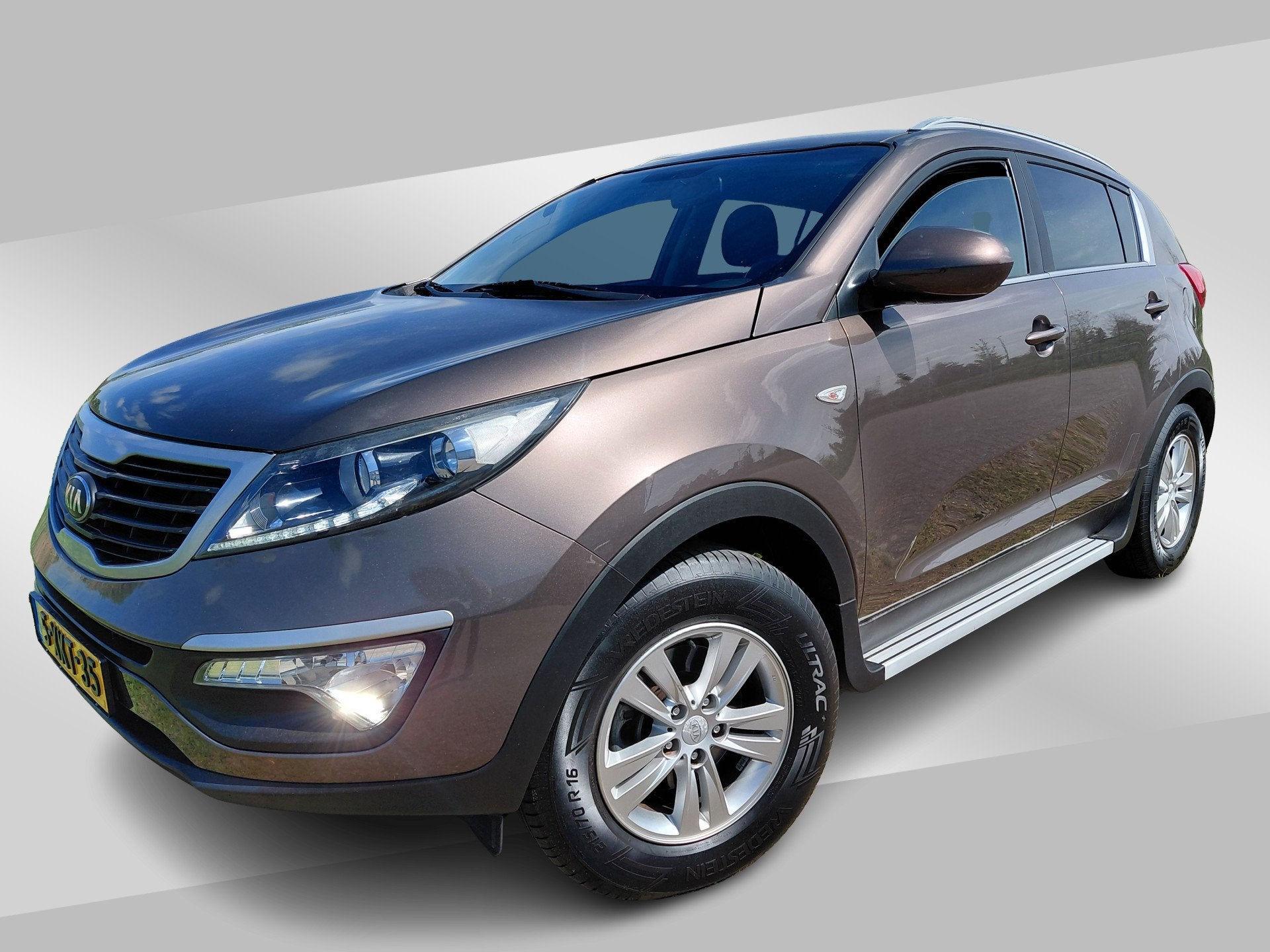 Kia Sportage 1.6 GDI Vibe (bj 2014), Auto's, Voorwielaandrijving, Euro 5, 4 cilinders, Bruin
