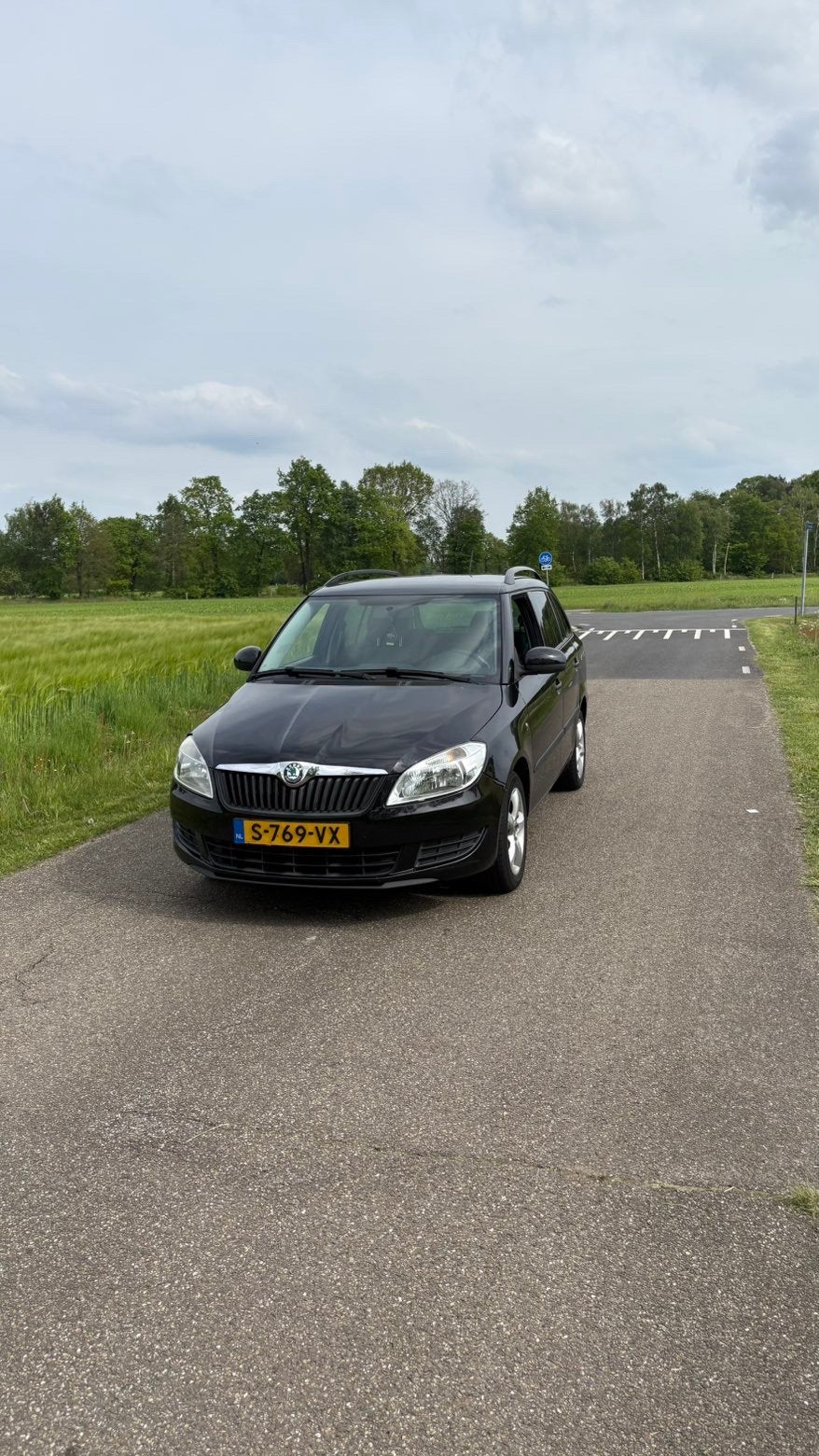 Skoda Fabia 1.2 44KW Combi 2014 Zwart, Auto's, Skoda, Voorwielaandrijving, 40 €/maand, 1198 cc, Zwart