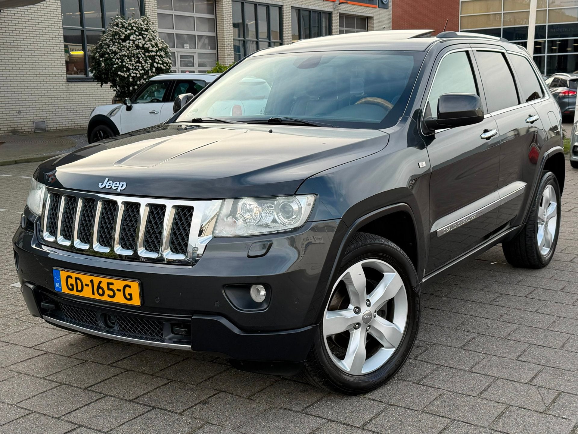 Jeep Grand Cherokee 3.6 Overland l PANO l ONDERHOUDSHISTORIE, Automaat, Euro 5, Zwart, Zwart