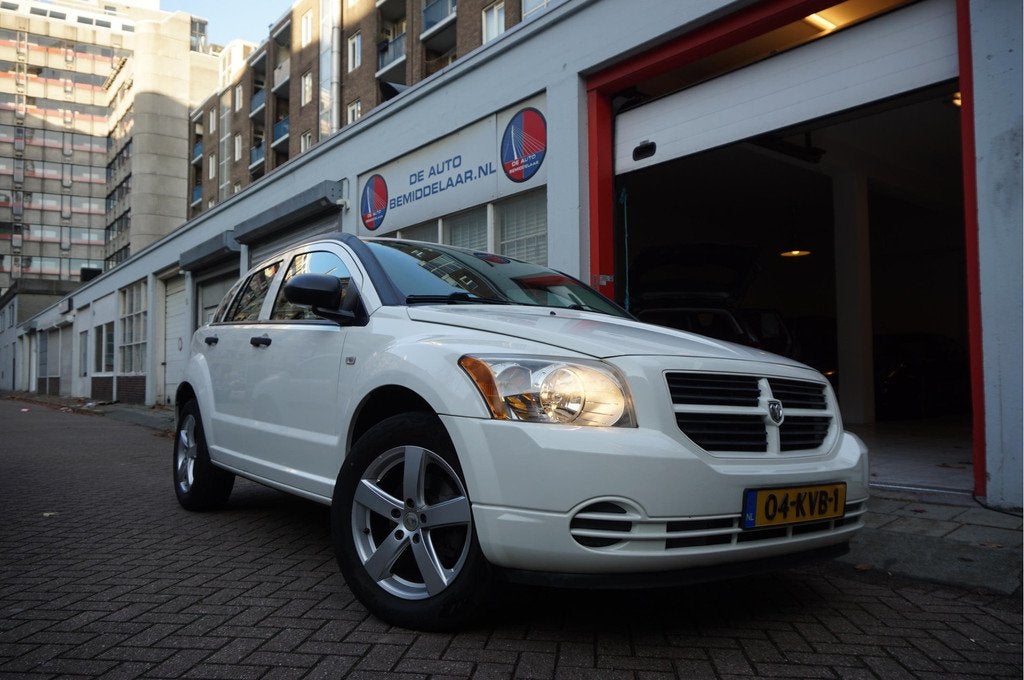 Dodge Caliber 2.0 SXT Automaat | Trekhaak | Sportvelgen | NA, Auto's, Dodge, 1998 cc, Gebruikt, Zwart, Wit