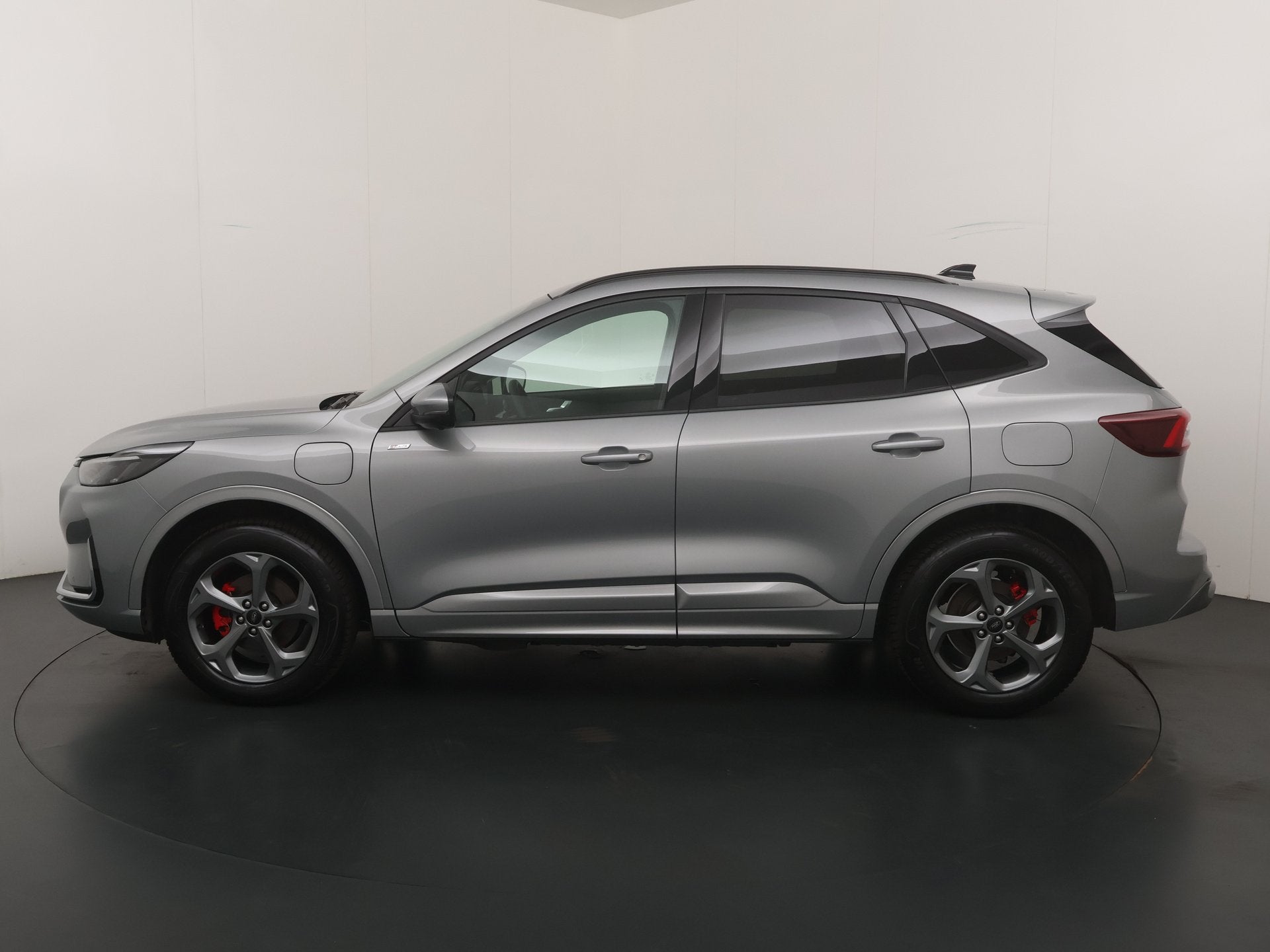 Ford Kuga 2.5 PHEV 243 pk ST-Line X I AGR stoelen | Adapt Cr, Auto's, Ford, 12 maanden, 14 kWh, Gebruikt, Zwart