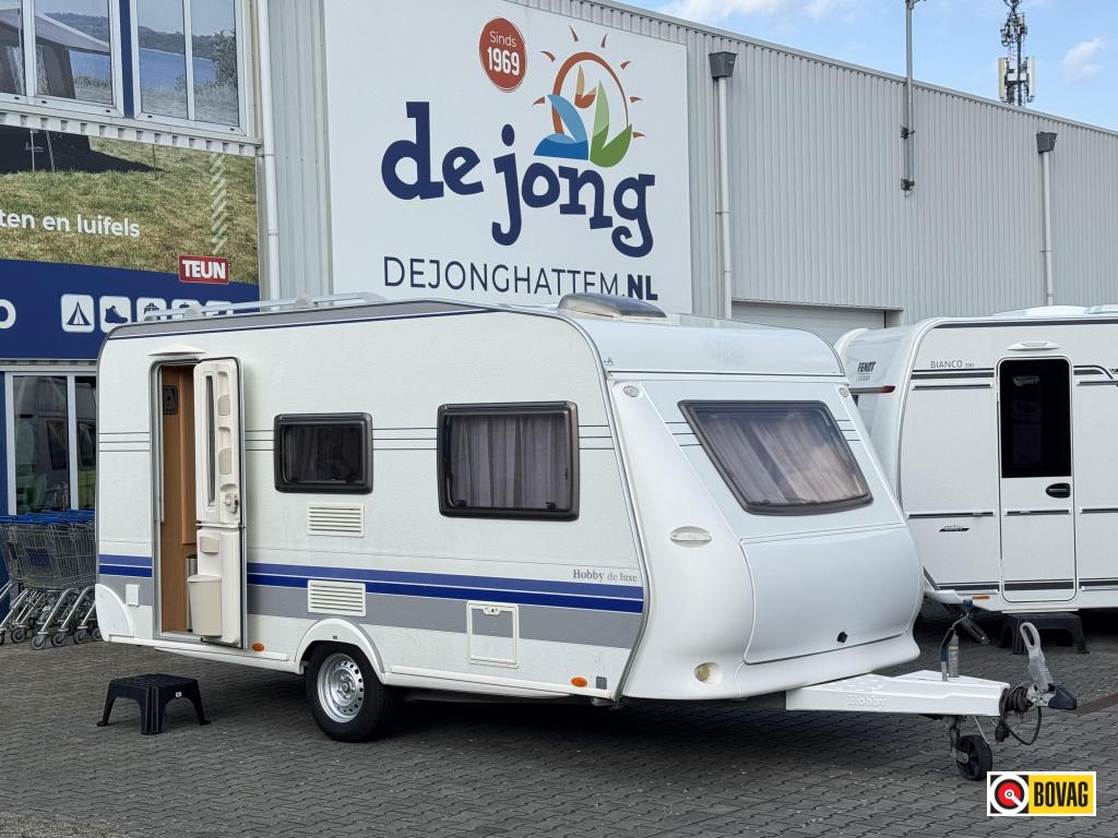 Hobby De Luxe 440 SF Voortent + Uitbouw, Caravans en Kamperen, Caravans, Schokbreker, Hobby, Bedrijf, Treinzit