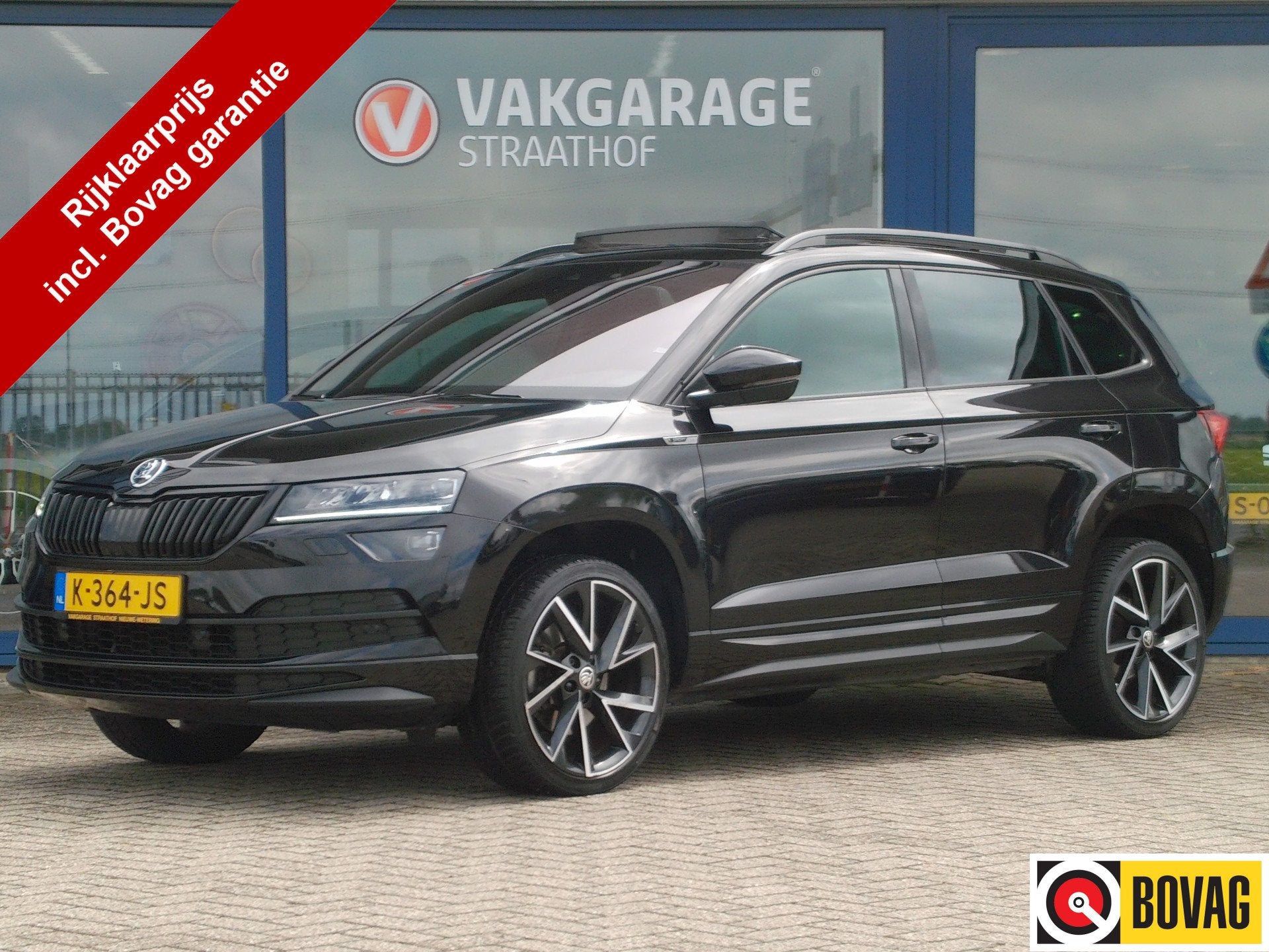 Skoda Karoq 1.5 TSI Sportline Business Automaat / Trekhaak /, Stof, 4 cilinders, Zwart, Bedrijf