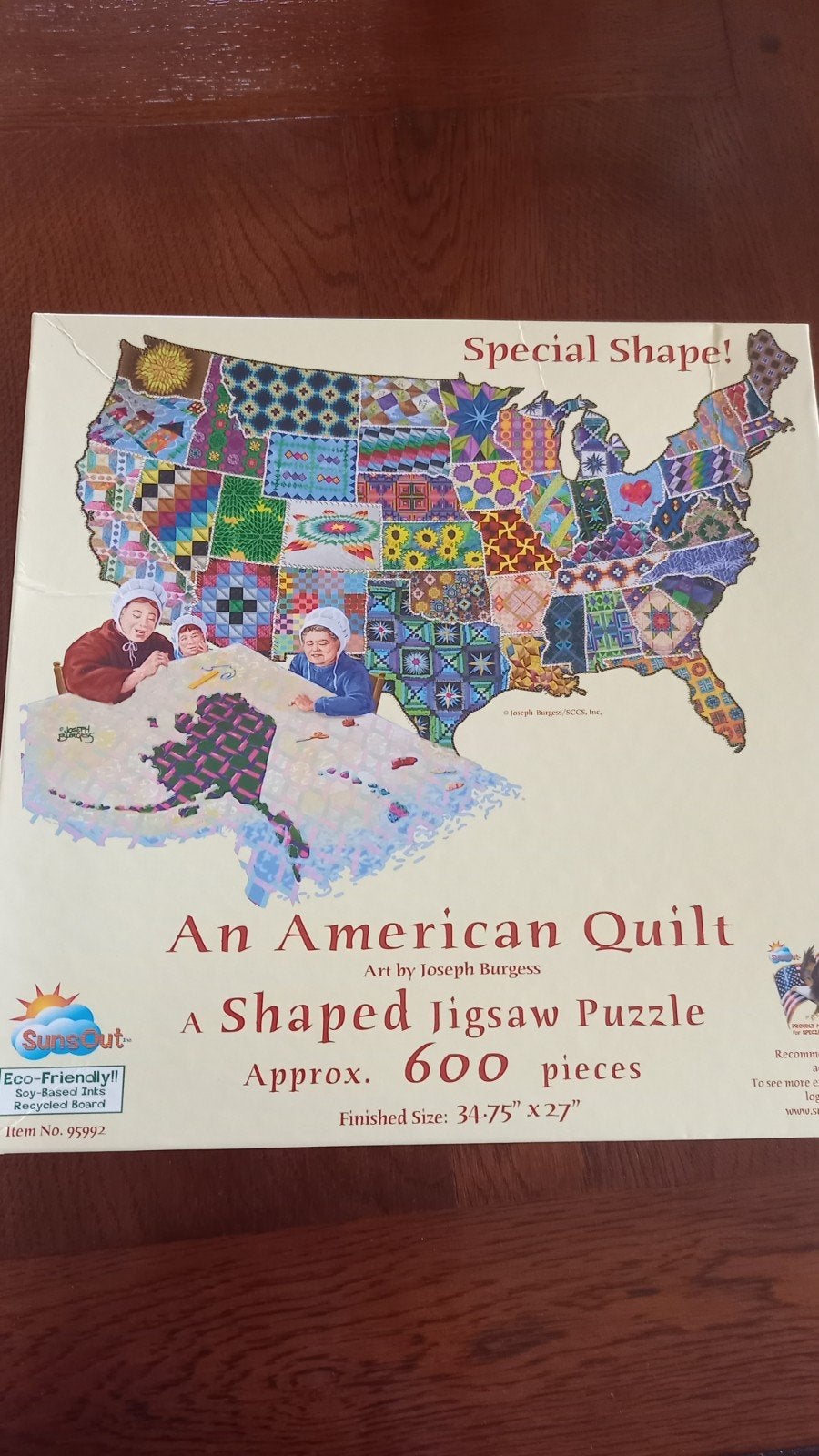 SunsOut puzzel 'An American Quilt' - 600 stukjes, Hobby en Vrije tijd, Ophalen of Verzenden