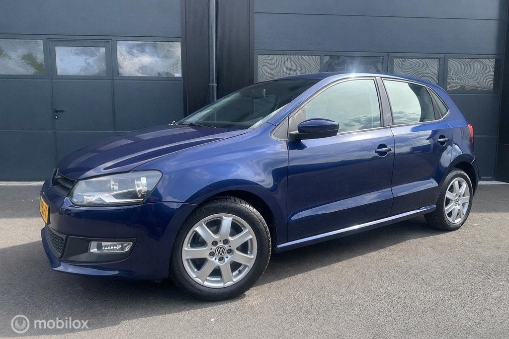 Volkswagen Polo 1.4-16V Comfortline, Auto's, Voorwielaandrijving, 4 cilinders, Blauw, Origineel Nederlands