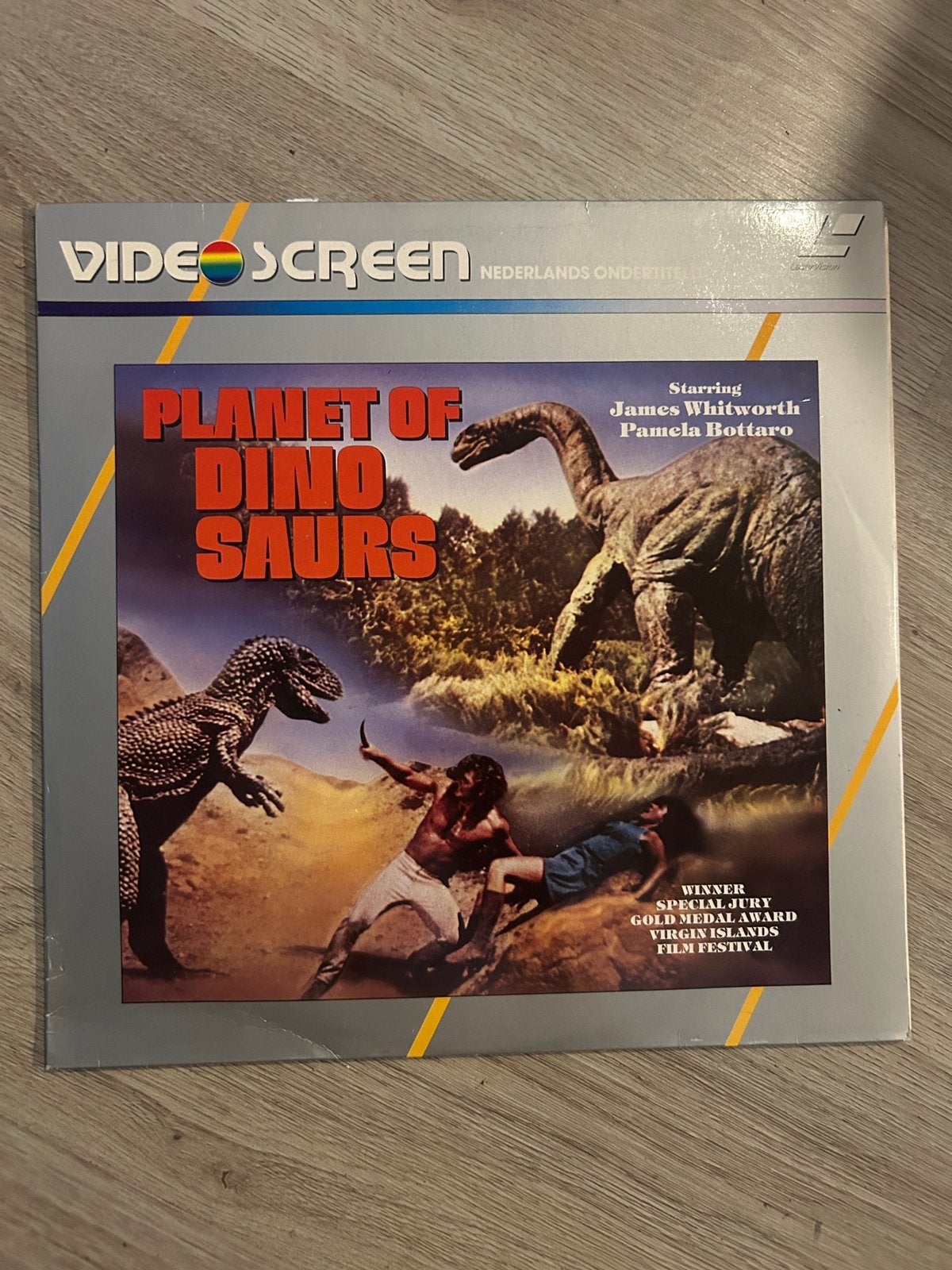 Laserdisc / Laservision Planet of Dinosaurs, Ophalen of Verzenden, Zo goed als nieuw