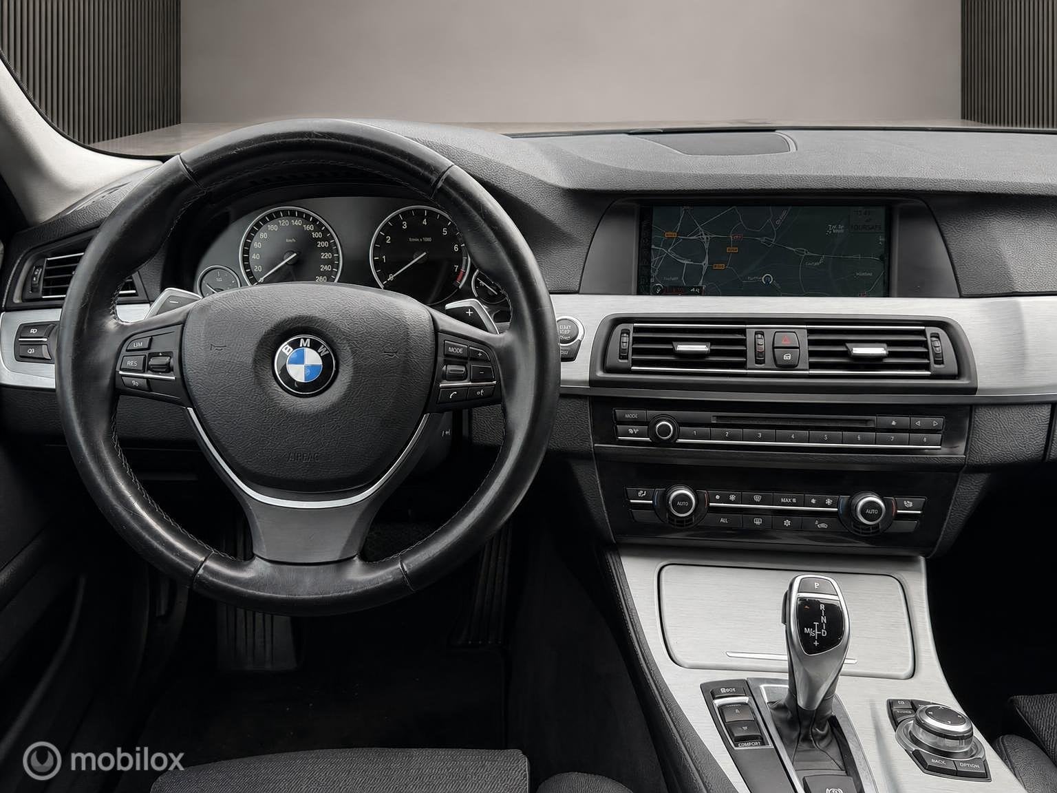 Foto 8 van BMW 5-serie Touring 520i High Executive
