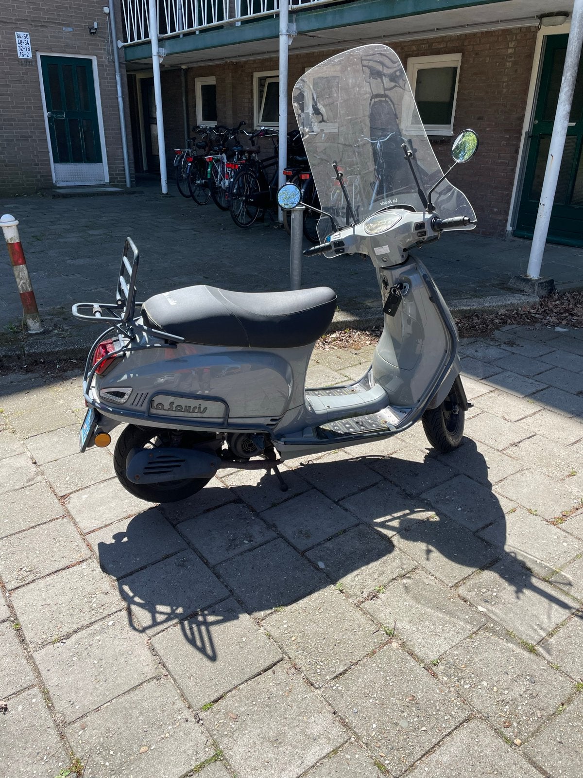 Blauwe scooter, opgevoerd naar 45 km/u, Fietsen en Brommers, Snorfietsen en Snorscooters, Ophalen, Gebruikt, Benzine, Overige merken