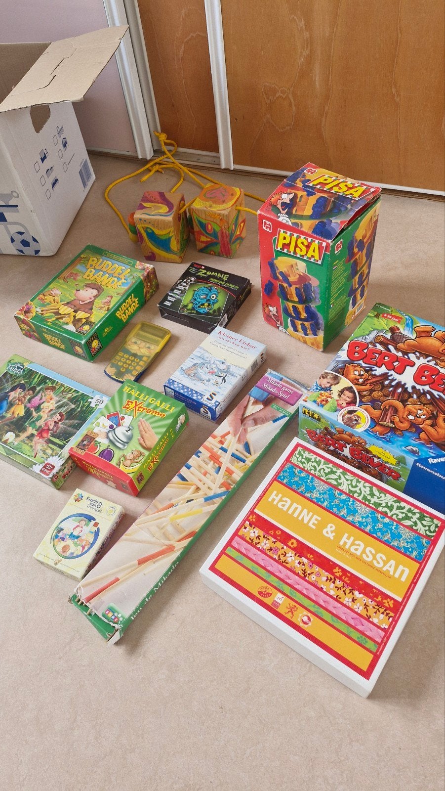 Doos met spellen rekenspelmachine puzzles halli galli, Ophalen