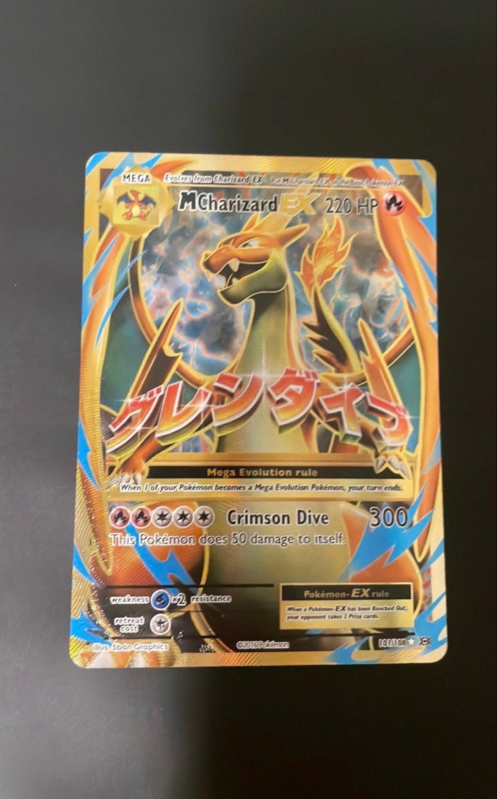 Pokémon M Charizard EX, Ophalen of Verzenden, Gebruikt, Losse kaart