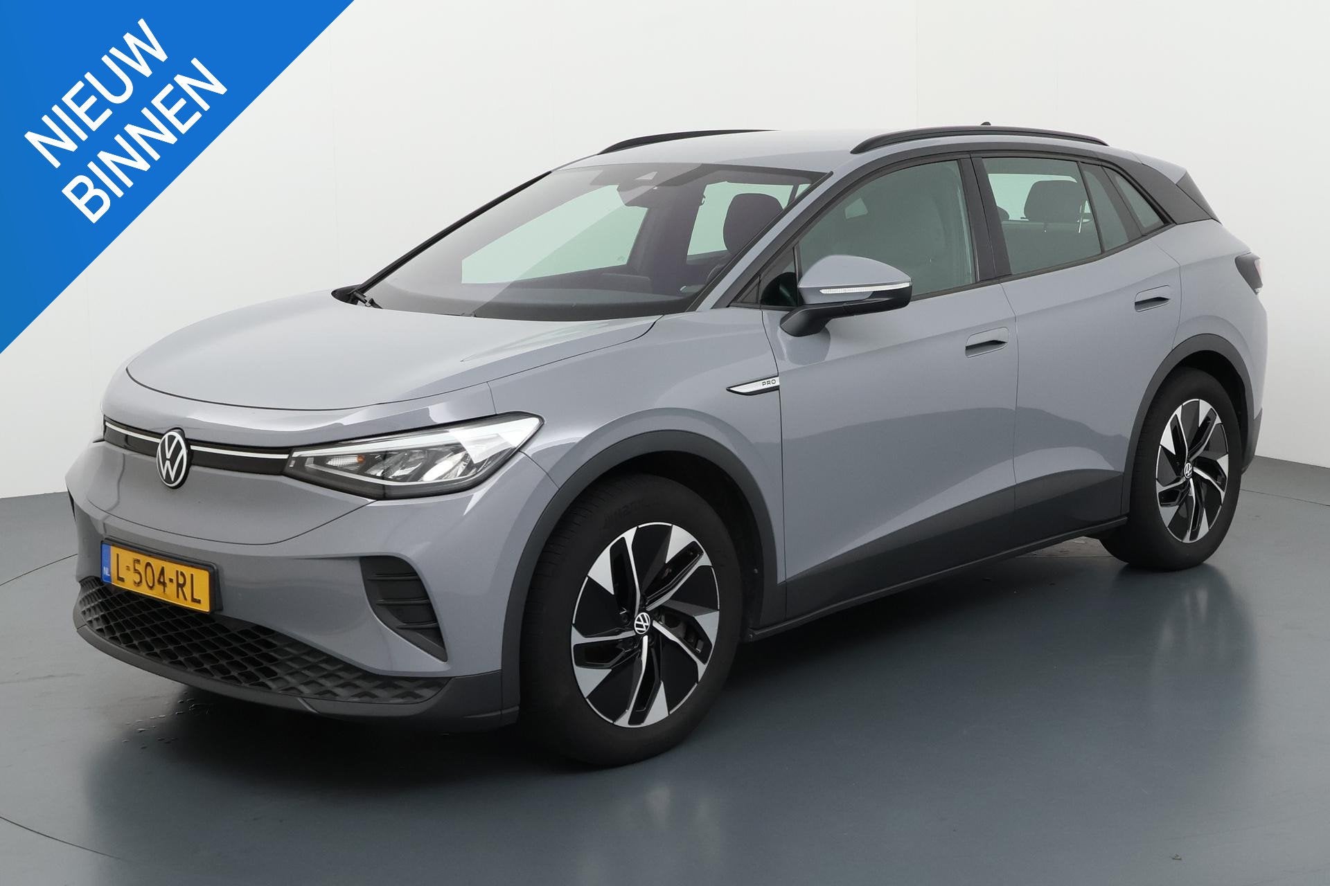VOLKSWAGEN ID.4 LIFE 77 KWH (90% SOH) I TREKHAAK I WARMTEPOM, Automaat, Met garantie (alle), Origineel Nederlands, Grijs