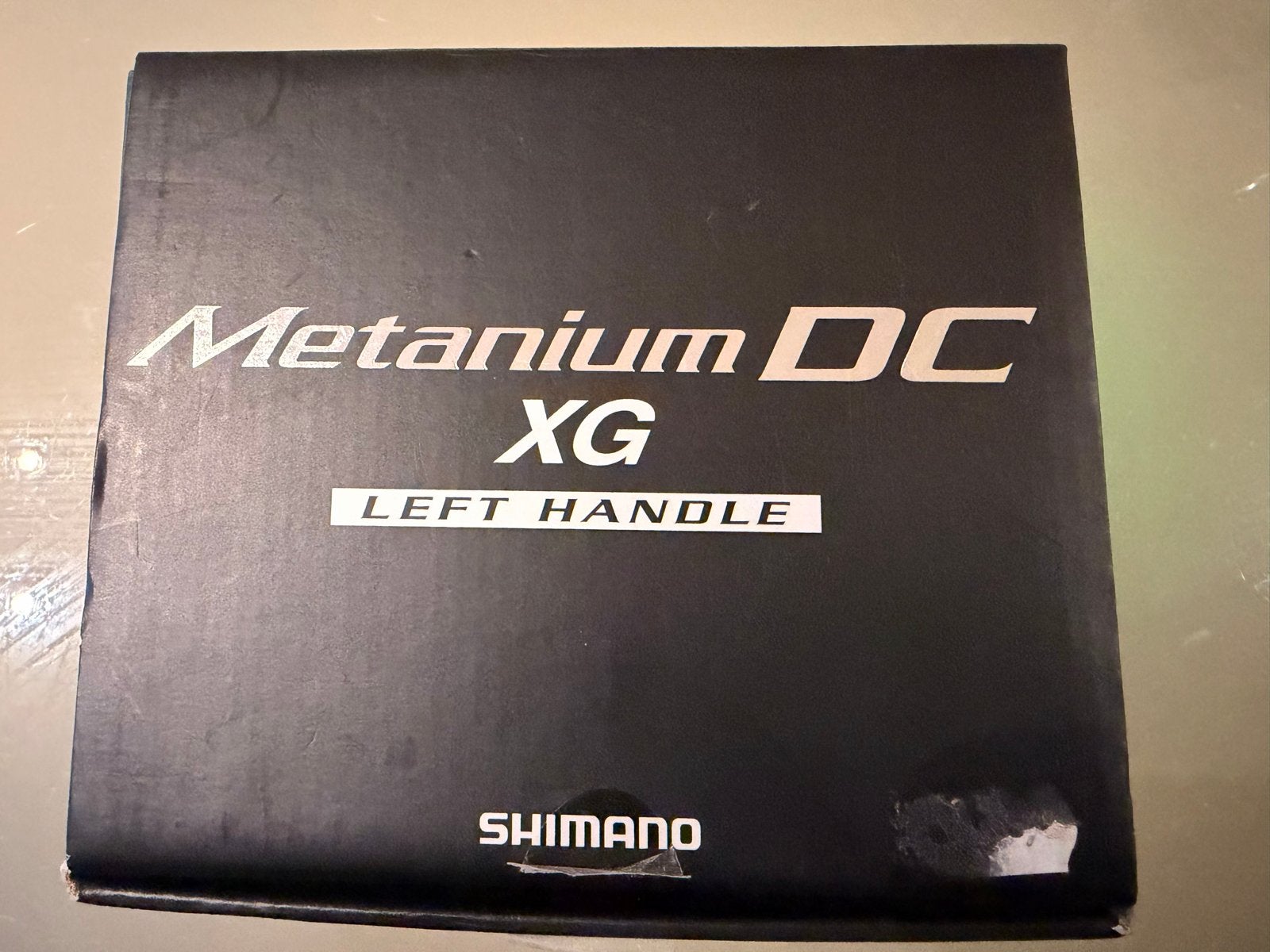 Shimano Metanium DC XG - Linkshandige Baitcaster Molen, Ophalen, Zo goed als nieuw, Molen