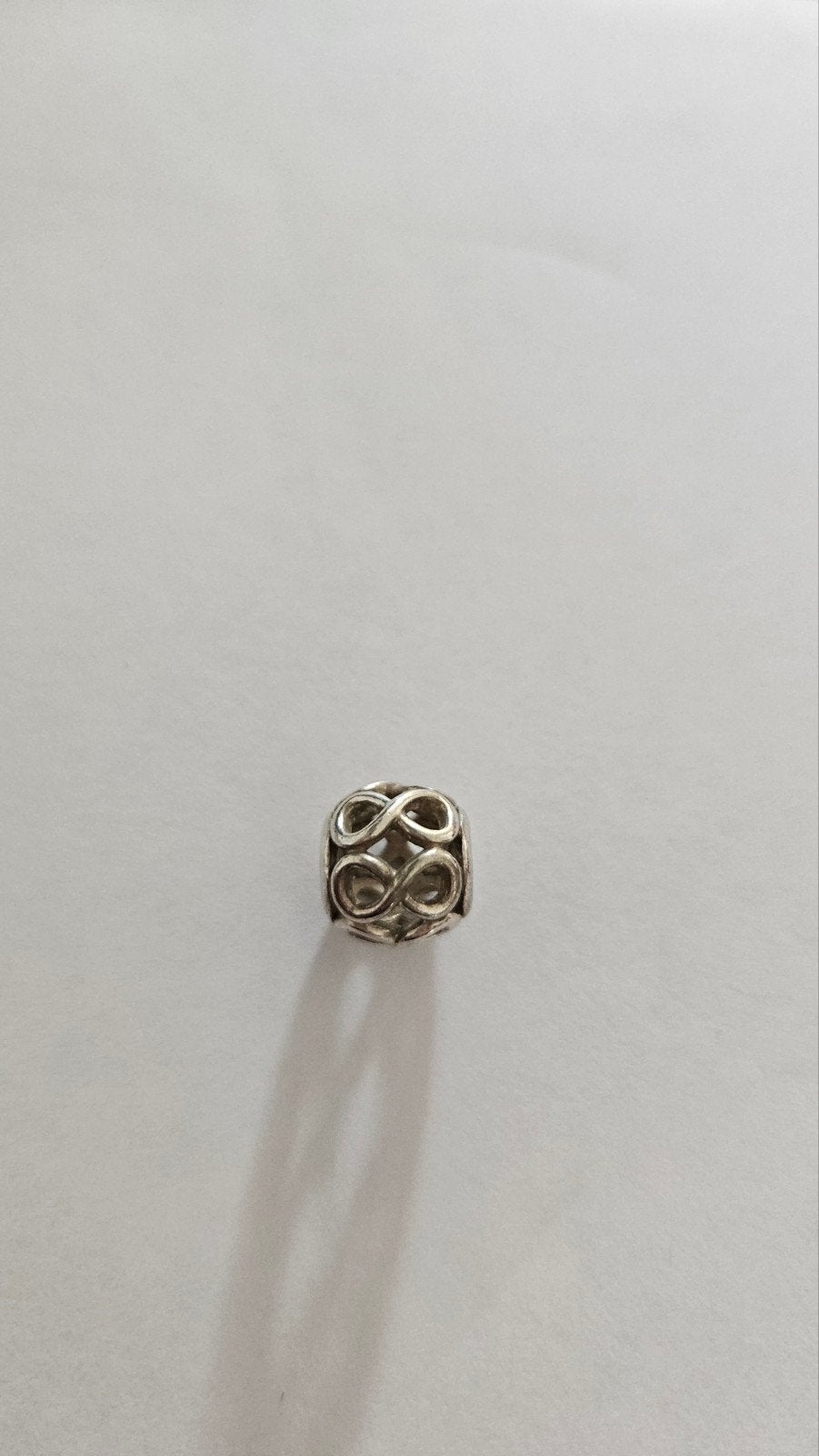 Pandora bedel / Infinity symbool / Zilver 925, Sieraden, Tassen en Uiterlijk, Gebruikt, Pandora, Ophalen of Verzenden, 1 bedel