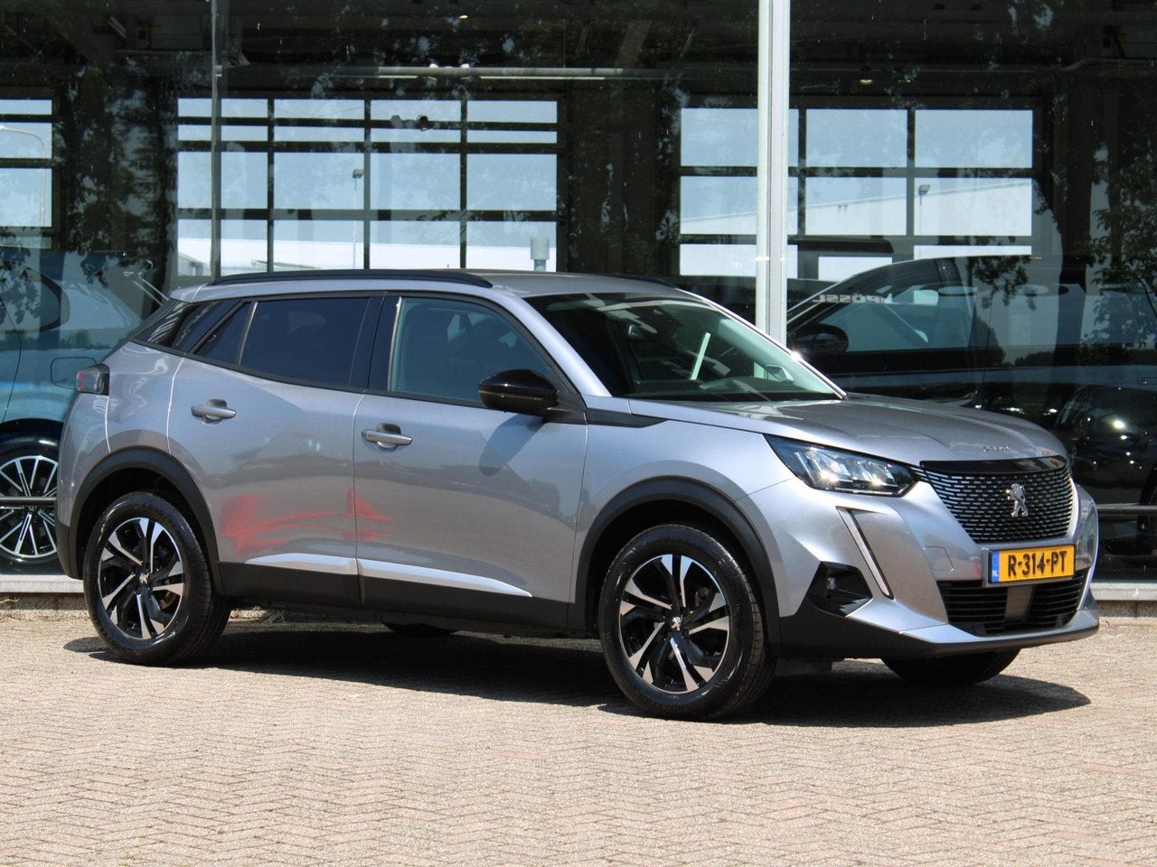 Peugeot 2008 1.2 PT Allure Pack | Camera/Trekhaak/Navi/Voorr, Auto's, Peugeot, Automaat, Gebruikt, 1199 cc, Bedrijf