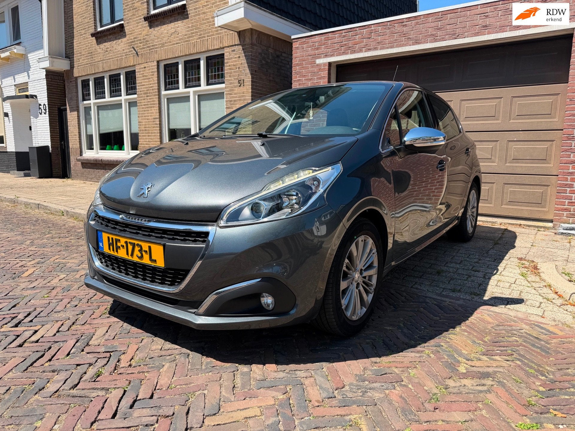 Peugeot 208 1.2 Allure Nieuwe APK, Auto's, Voorwielaandrijving, Stof, Gebruikt, 1199 cc