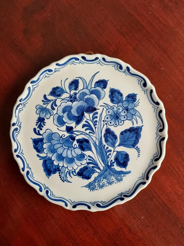 Oud delfts blauw bordje van De Porceleyne Fles, Ophalen