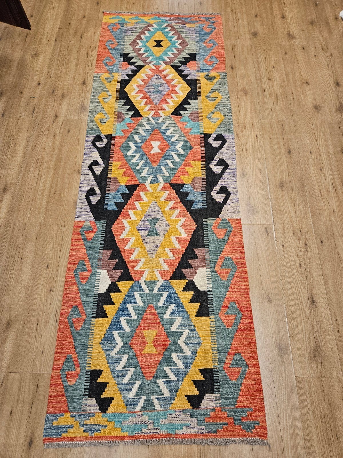 Prachtige handgeweven oosterse wollen kelim loper 262x84