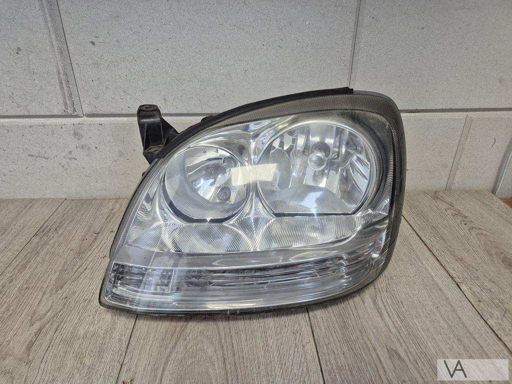Koplamp links Nissan Almera Tino 2000 - 2007 witte knipper, Gebruikt, -, -, Ophalen of Verzenden