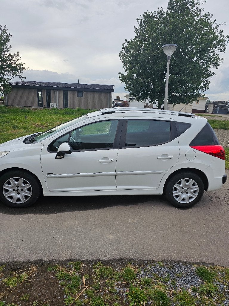 Peugeot 207 1.4 VTI 16V SW 2011 5DRS Wit, Auto's, Voorwielaandrijving, Stof, Zwart, Wit