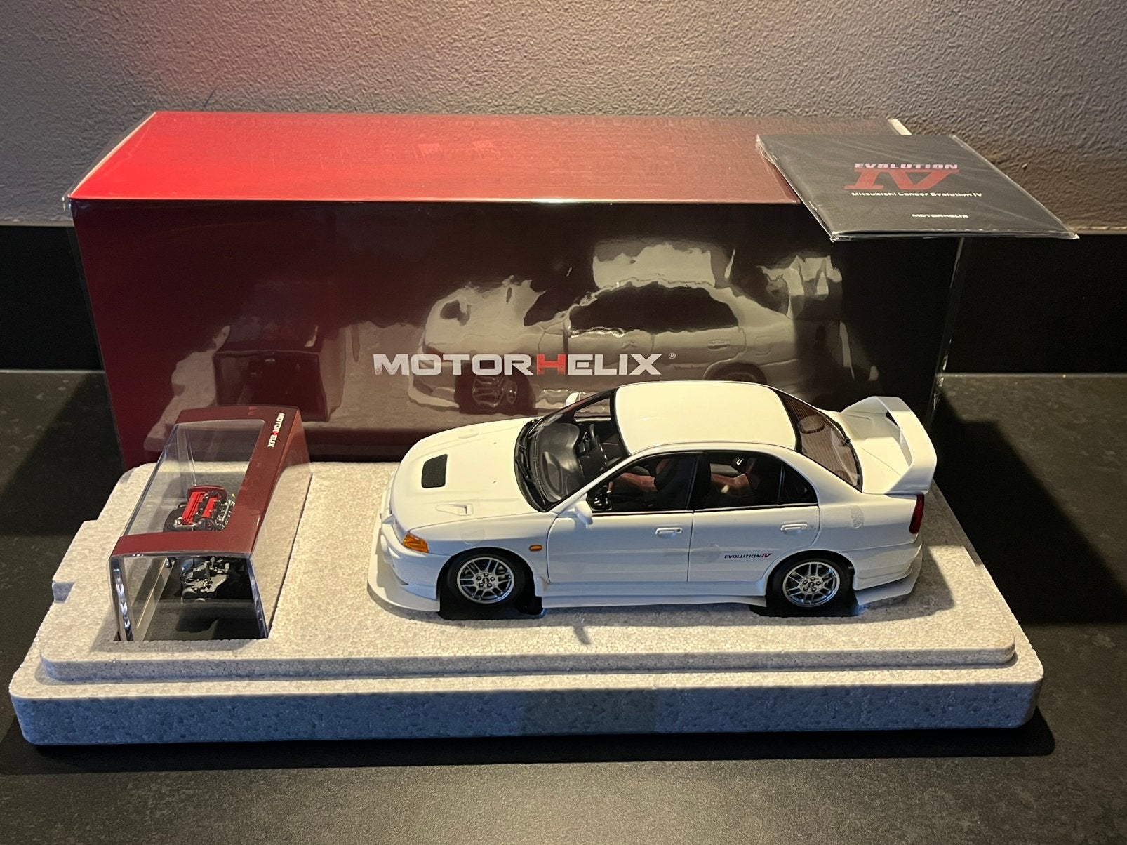 Motorhelix 1:18 Mitsubishi Lancer Evolution IV Scotia White, Hobby en Vrije tijd, Modelauto's | 1:18, Nieuw, Auto, Overige merken