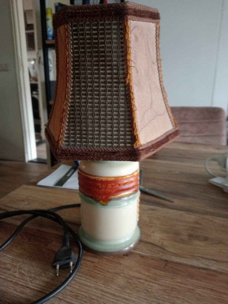 Goebel lamp, Ophalen
