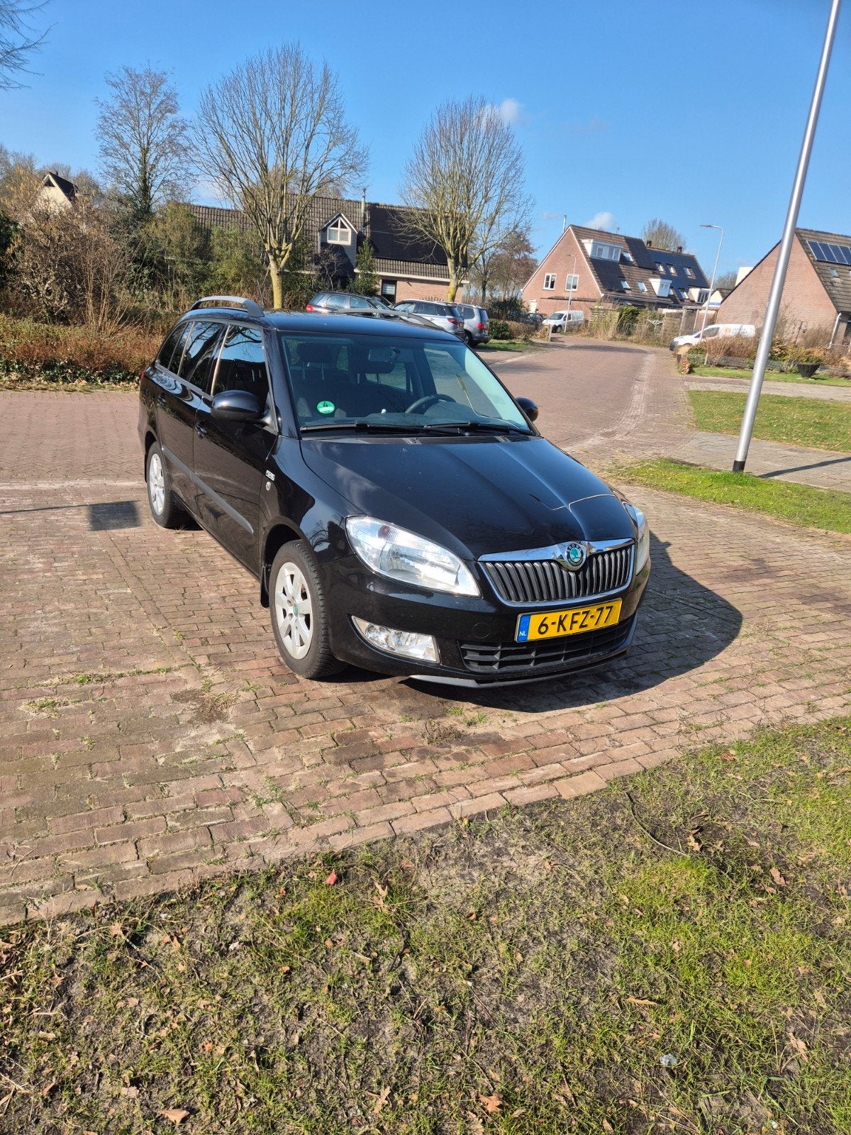 Skoda Fabia 1.2 TSI 63KW Combi 2012 Zwart, Auto's, Skoda, Voorwielaandrijving, Stof, 40 €/maand, Zwart