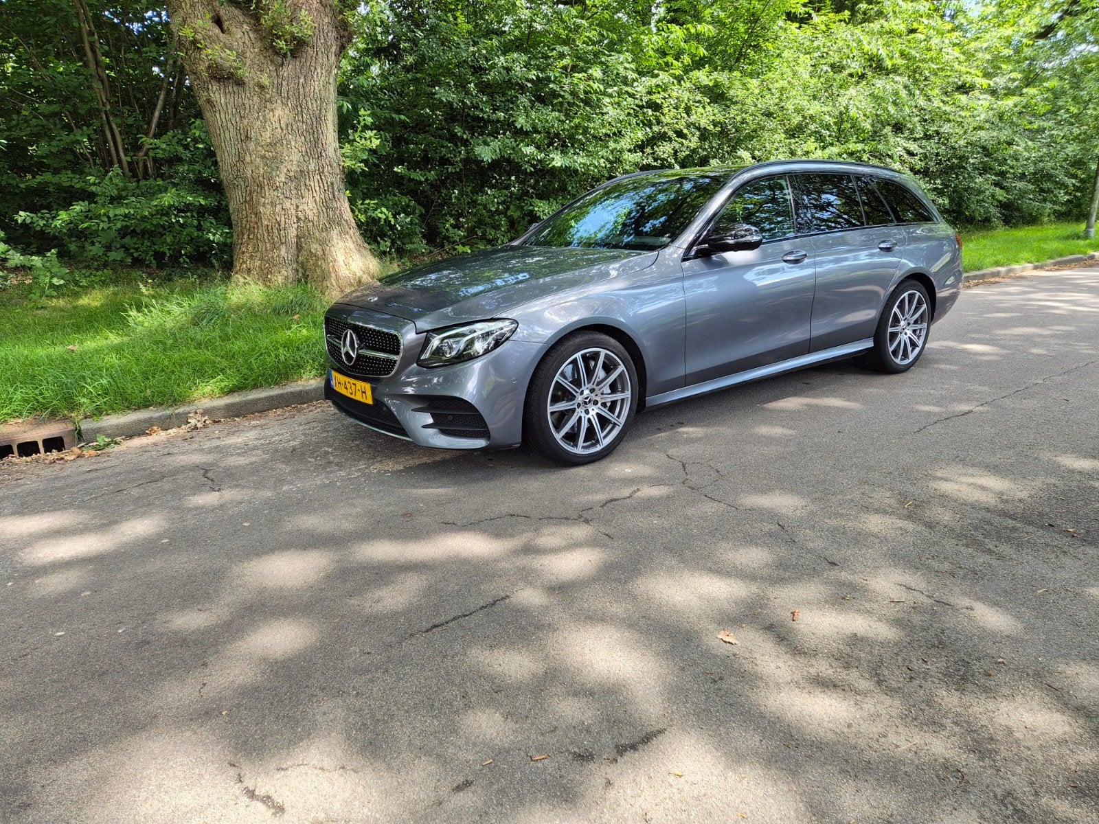 Mercedes-Benz E400 4-matic, Zwart, Parkeerassistent, Leder, Stationwagon