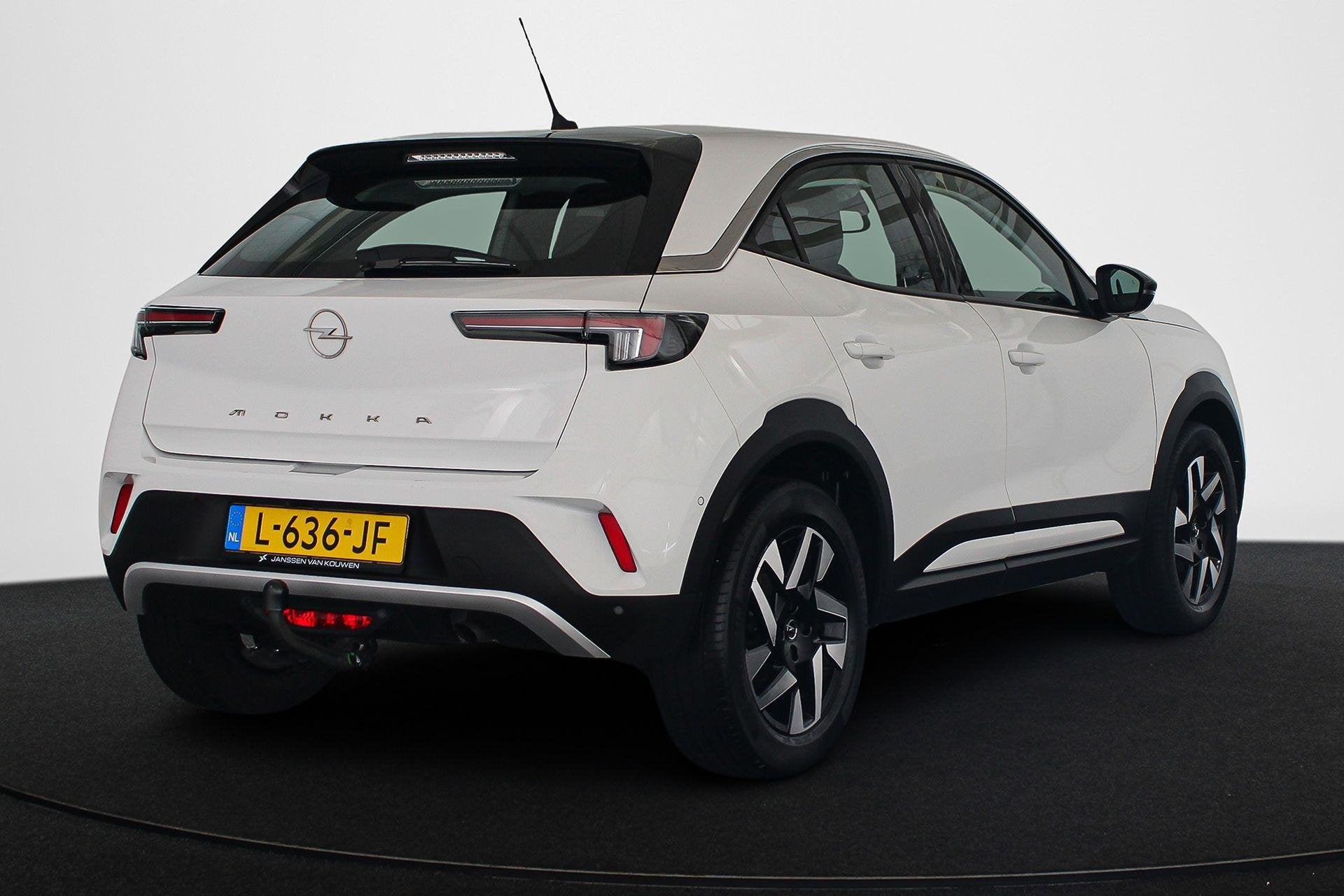 Opel Mokka 1.2 Elegance Apple CarPlay Trekhaak Achteruitrijc, Auto's, Opel, Voorwielaandrijving, Stof, Gebruikt, Euro 6