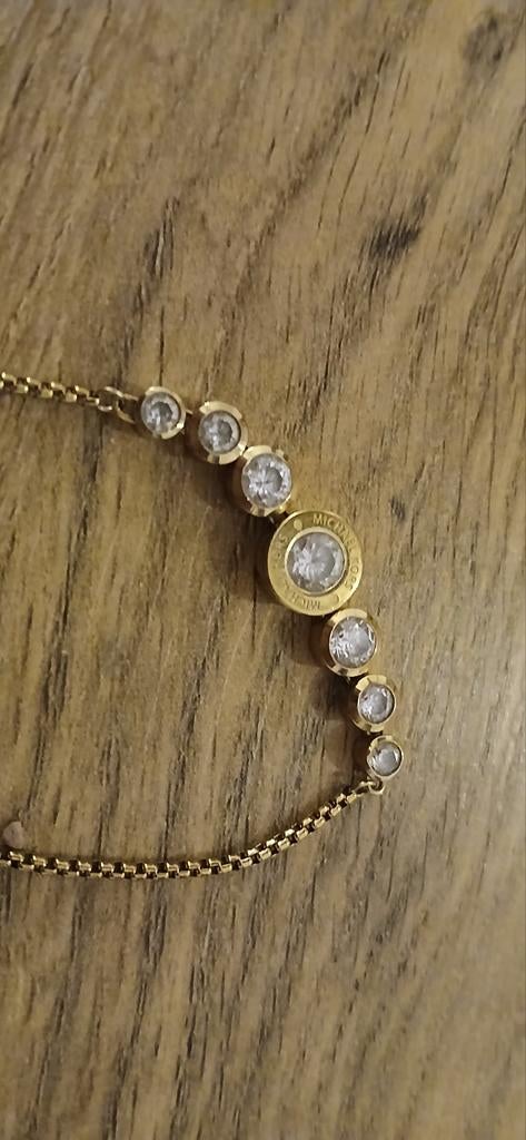 Michael Kors armband - reparatie nodig, Sieraden, Tassen en Uiterlijk, Armbanden, Ophalen of Verzenden, Goud, Staal