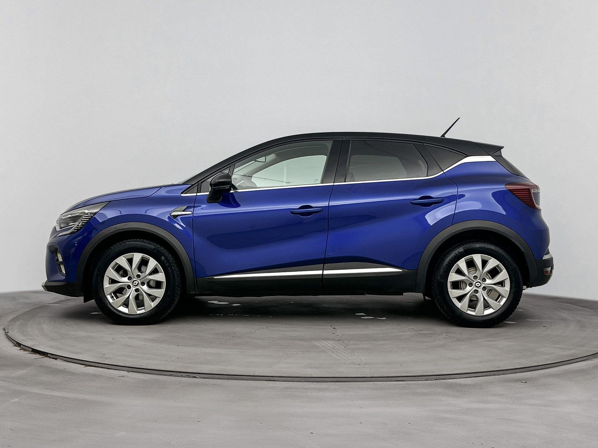 Renault Captur 1.3 TCe Intens 140PK | Automaat | Trekhaak |, Auto's, Gebruikt, 4 cilinders, Blauw, Leder en Stof