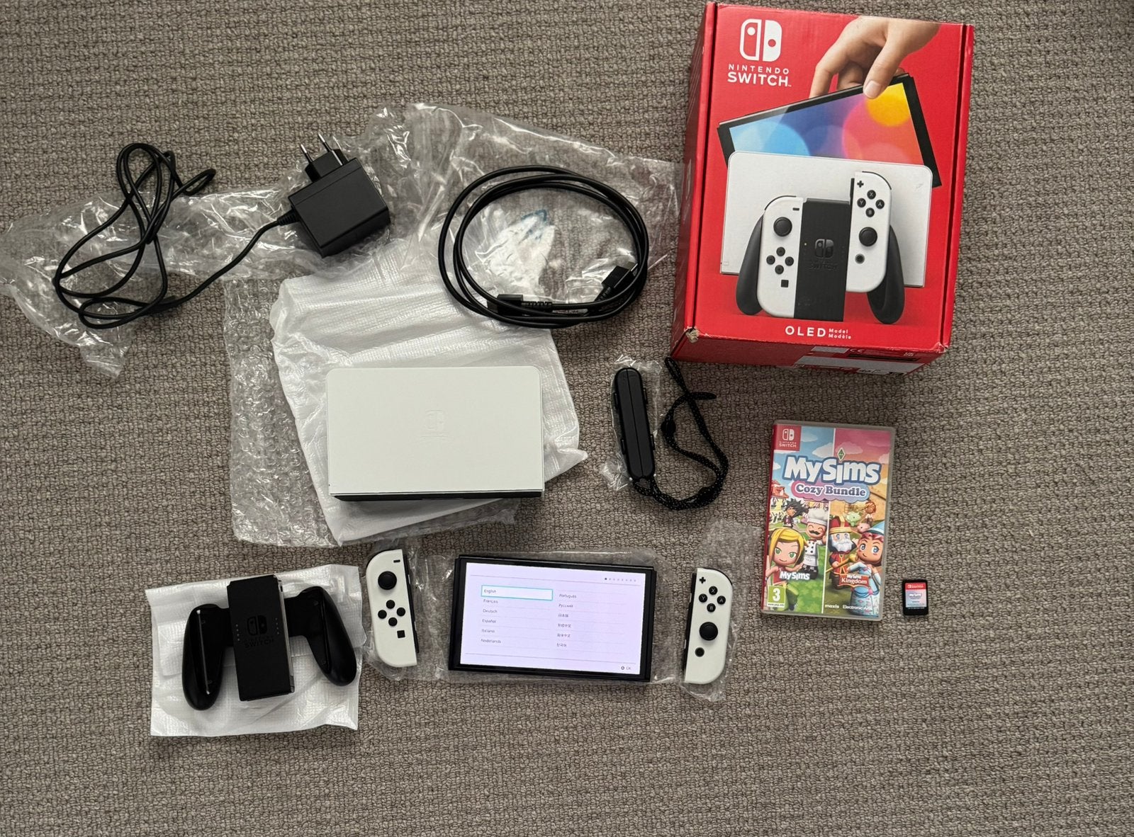 Nintendo Switch OLED Wit + 1 game - Absolute nieuwstaat, Spelcomputers en Games, Spelcomputers | Nintendo Switch, Ophalen of Verzenden