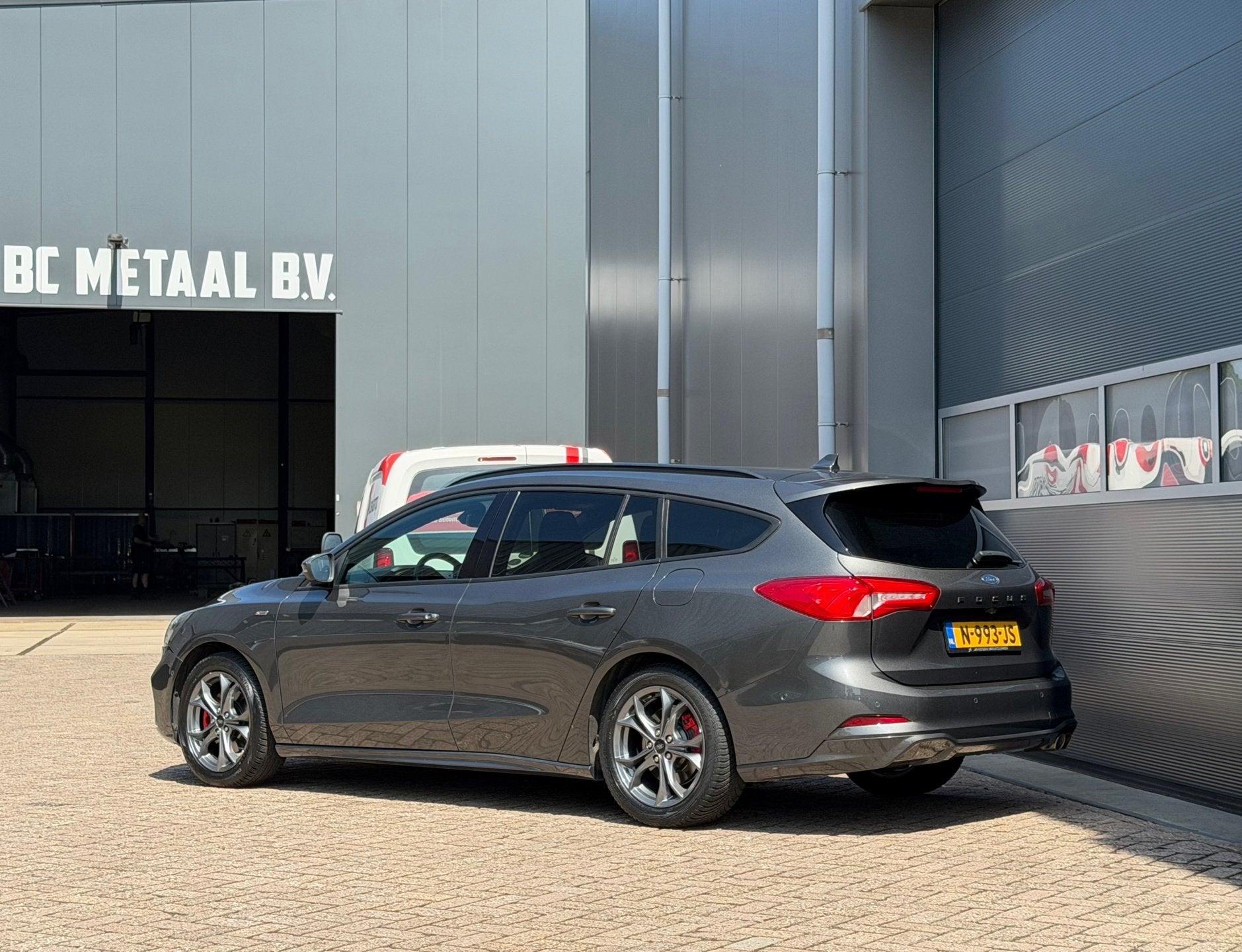 Ford Focus Wagon 1.0 Vignale ST-Line bj.2019 Camera|Navi|Pdc, Gebruikt, Euro 6, 1283 kg, Grijs