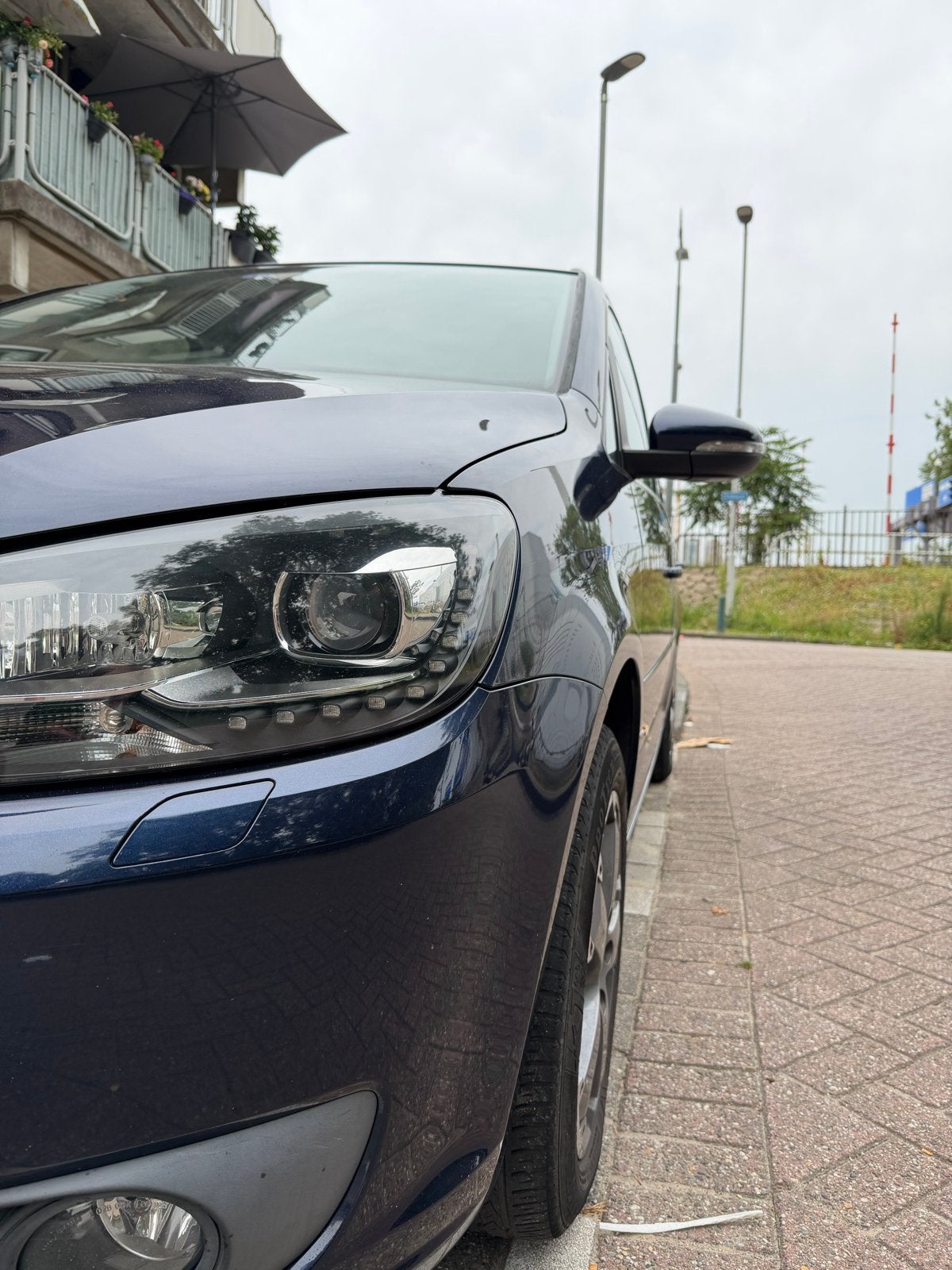 Volkswagen Touran 1.2 TSI 77KW BMT 7P 2012 Blauw, Voorwielaandrijving, Euro 5, Stof, Zwart