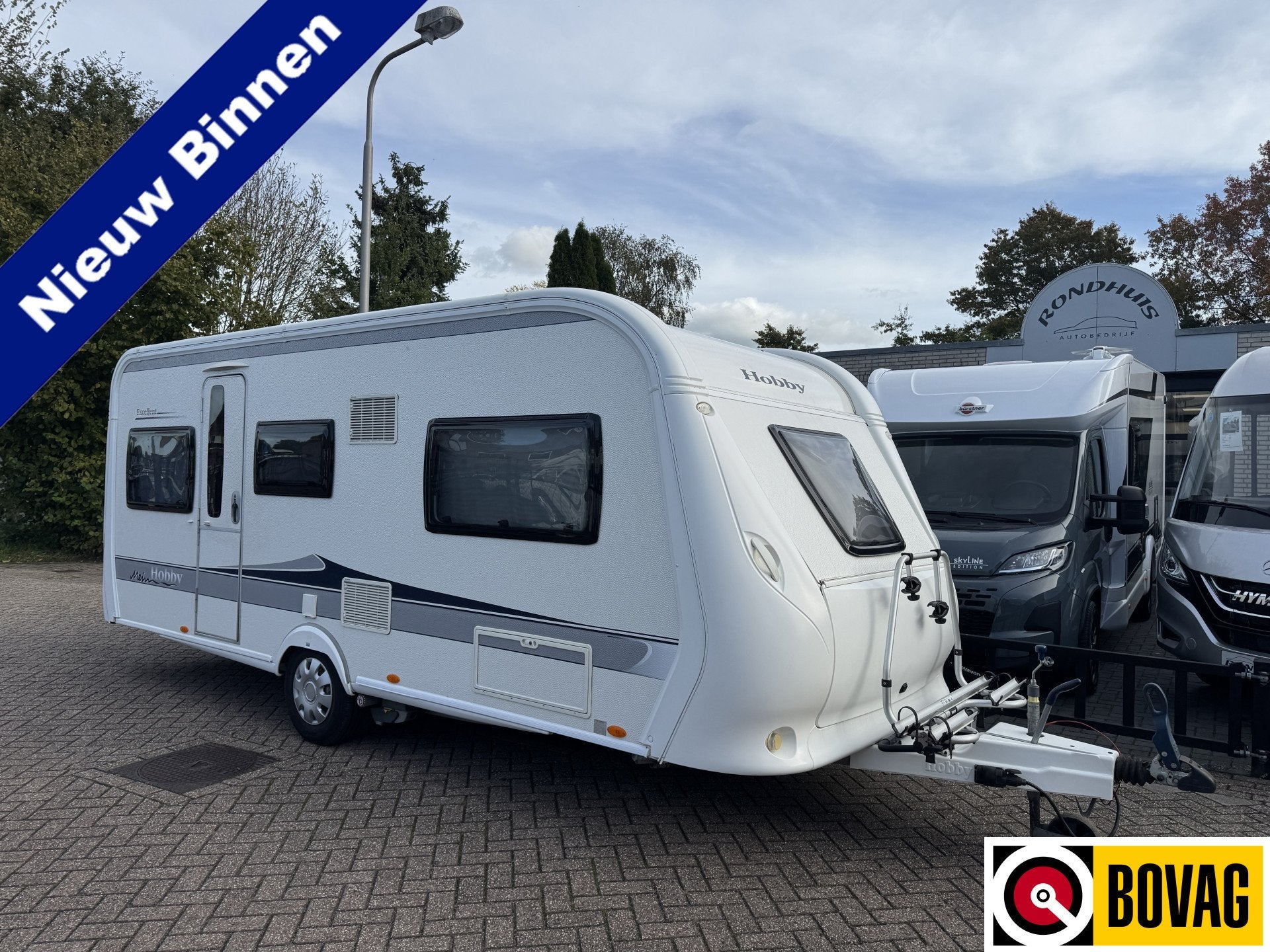 Hobby Excellent 495 UL met ENKELE BEDDEN en grote rondzit *M, Hobby, 7 tot 8 meter, Bedrijf, Reservewiel