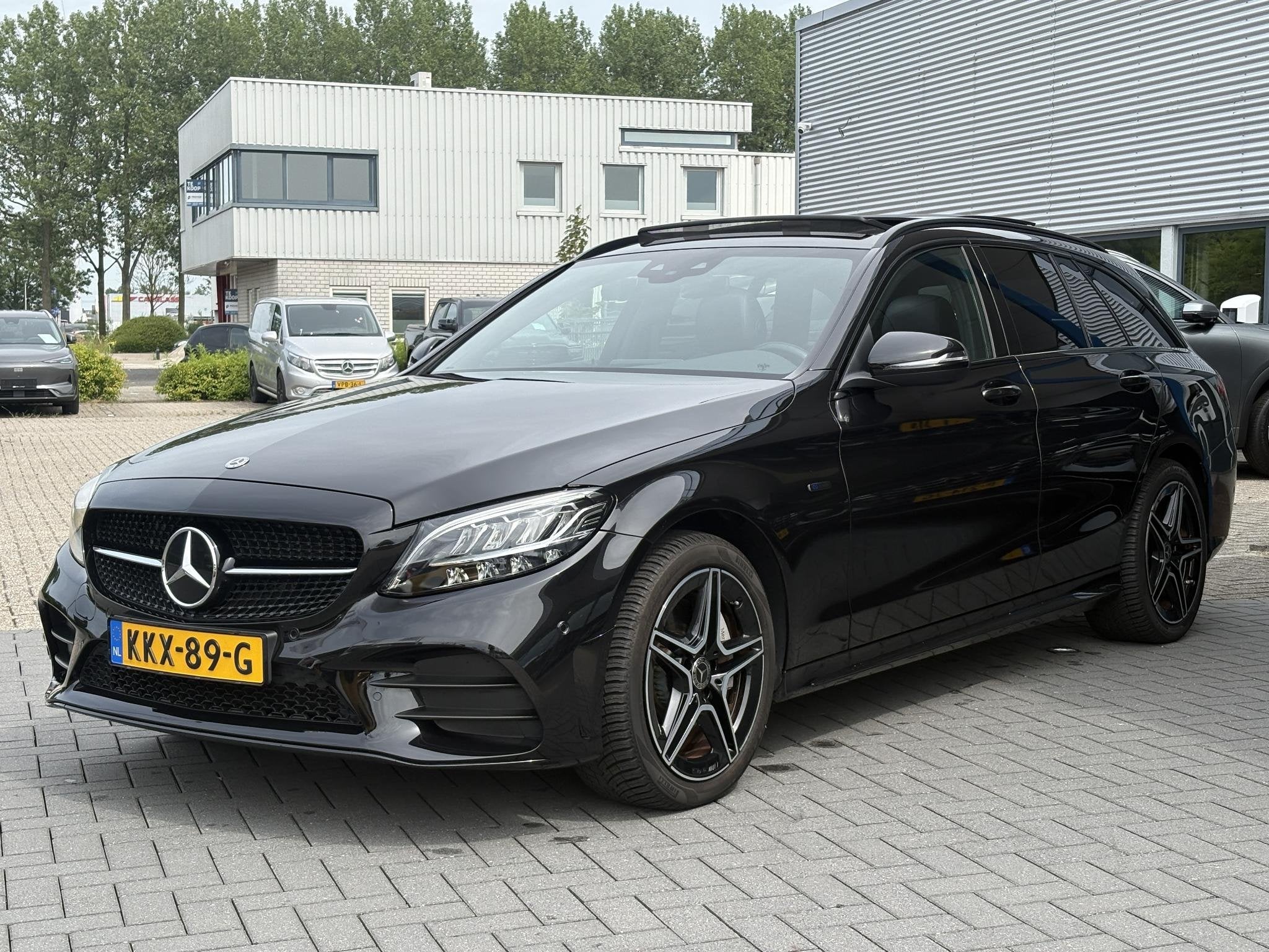 Mercedes-Benz C-klasse Estate 300e T AMG Line | Plug-in Hybr, Auto's, Automaat, 320 pk, Leder en Stof, Zwart
