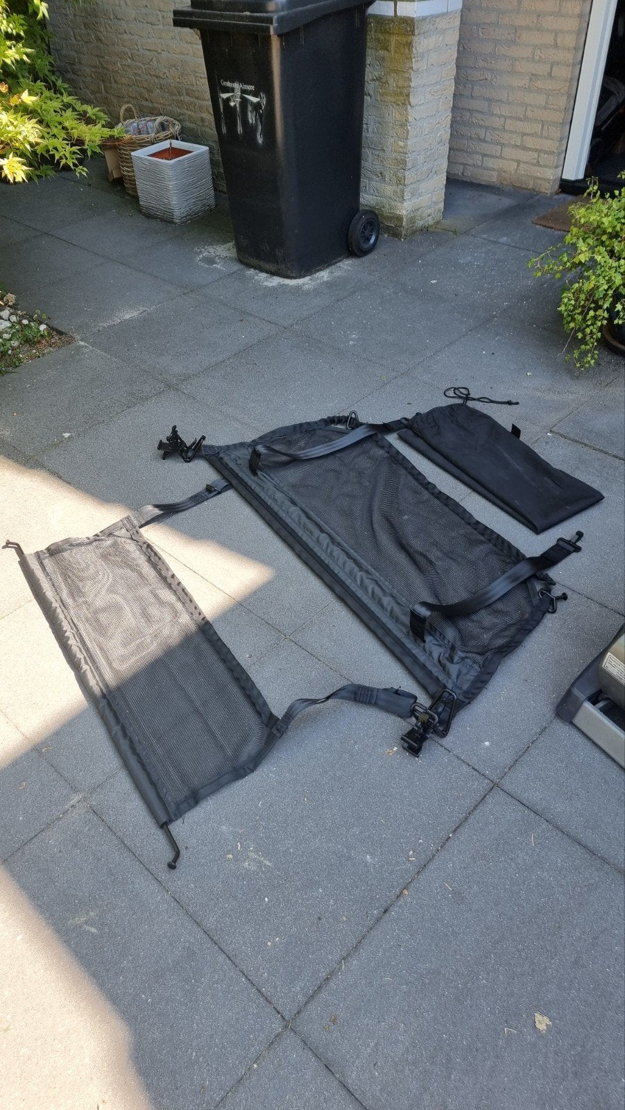 Hondenrek / Bagagenet voor auto, Ophalen